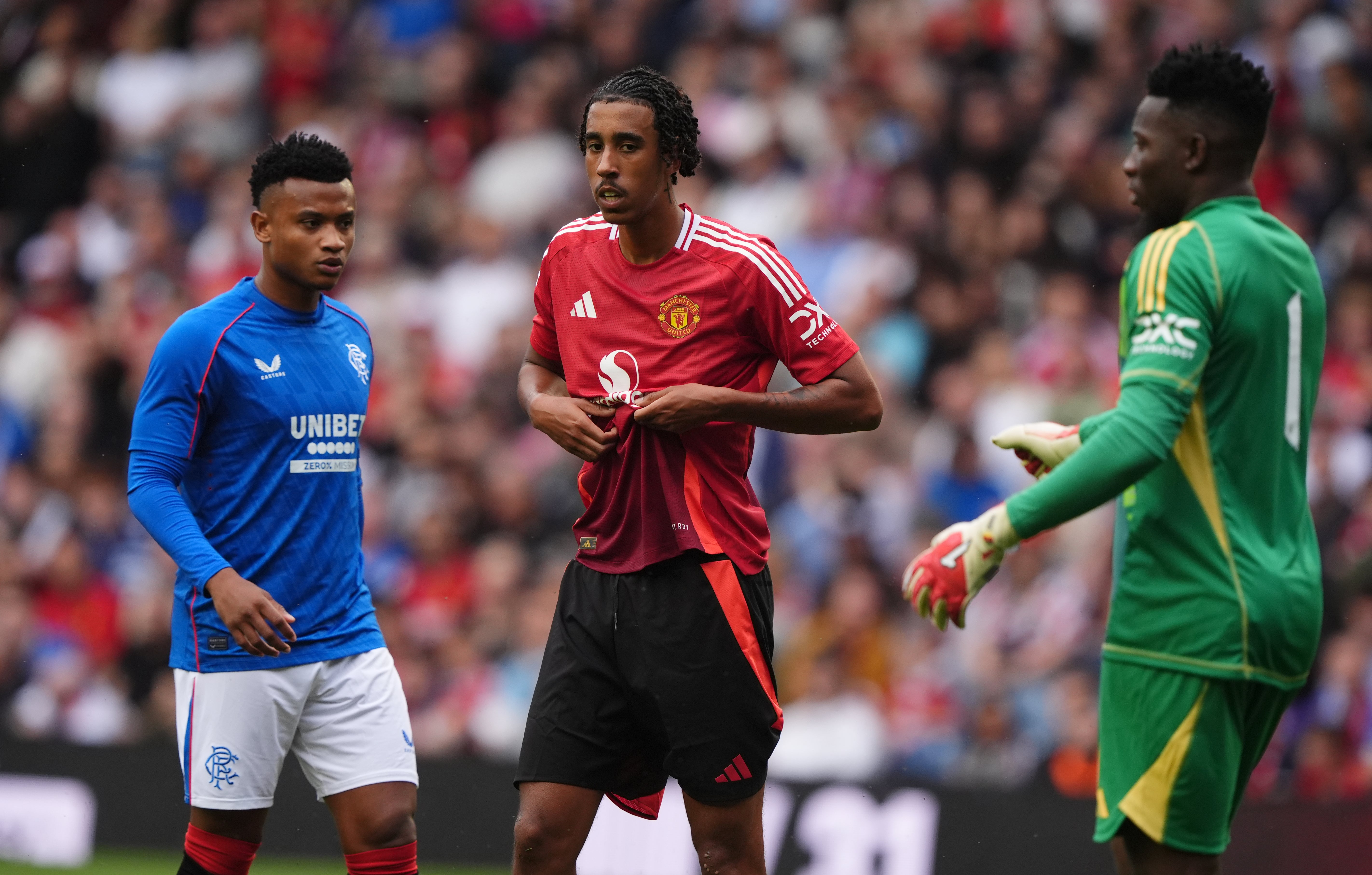 Leny Yoro (centre) got his first United outing against Rangers on Saturday (Andrew Milligan/PA)