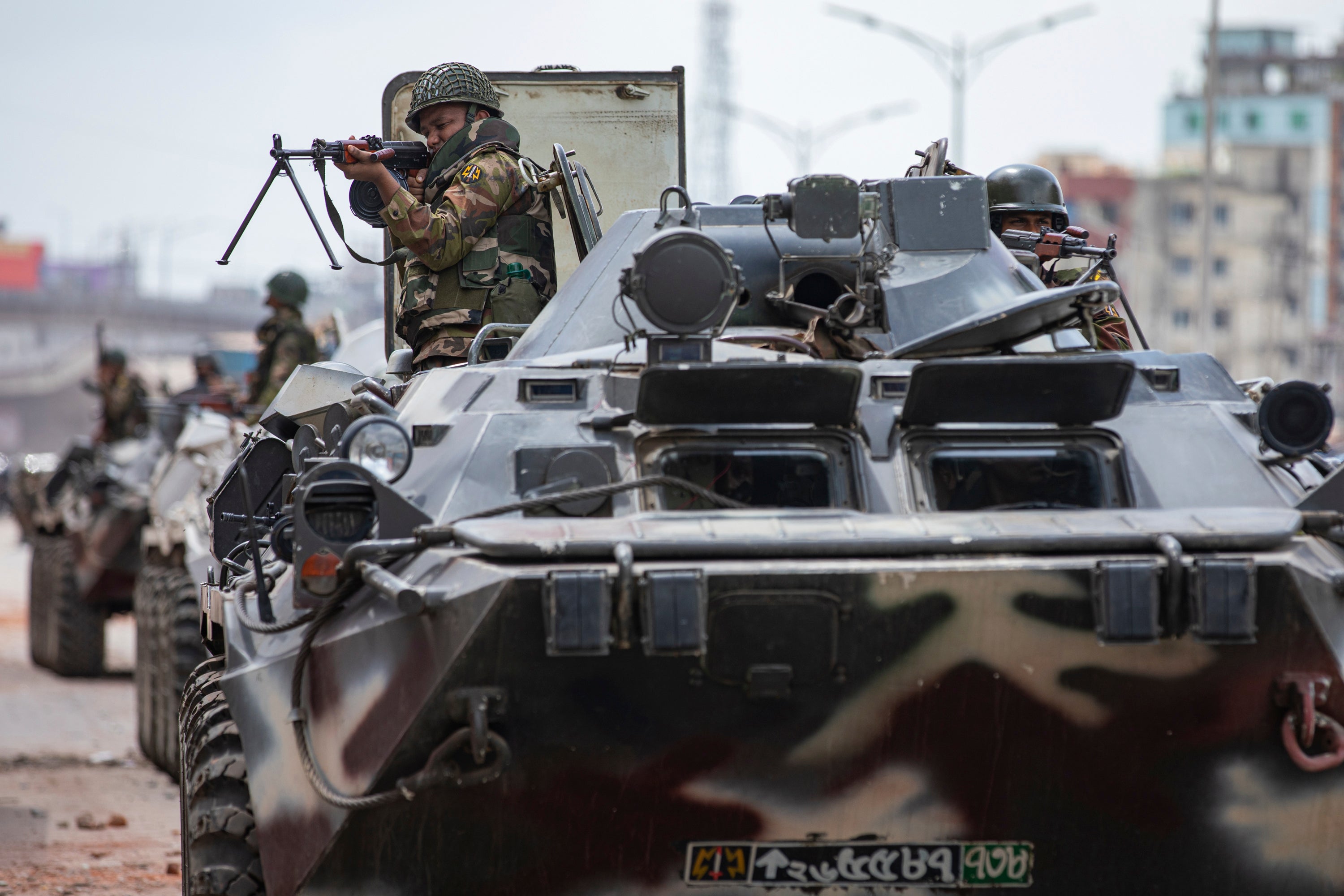 Bangladeshi soldiers patrol the streets of Dhaka