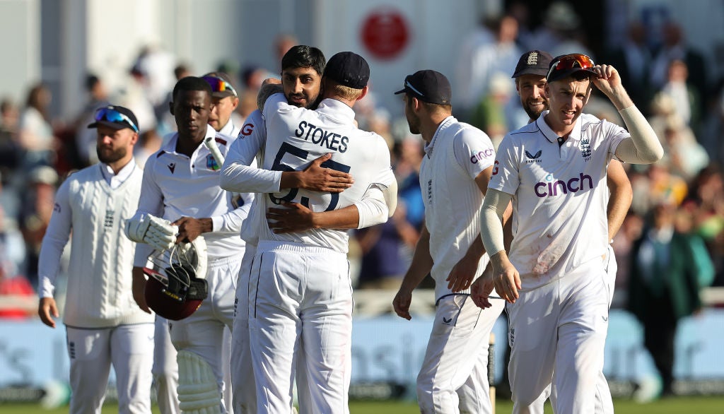 Shoaib Bashir is hugged by Ben Stokes after taking the final wicket and his fifth of the innings