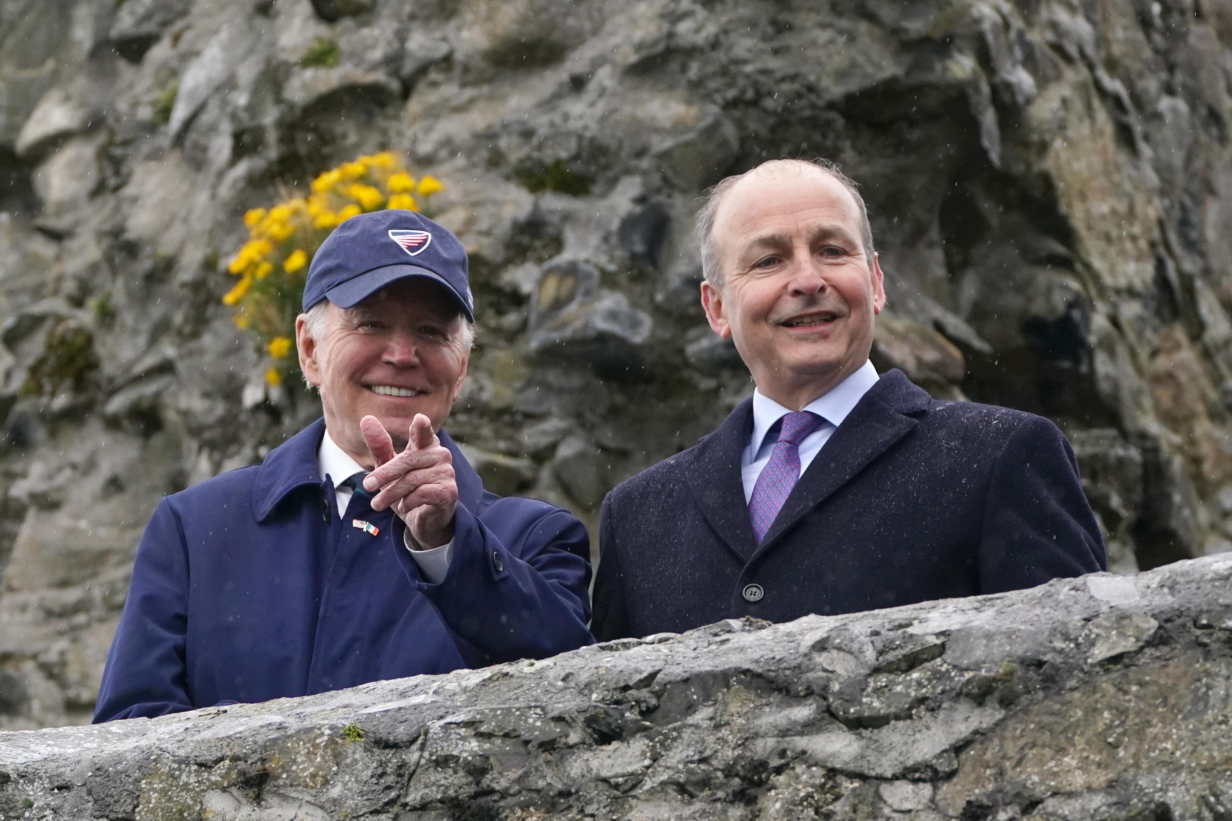 US President Joe Biden with Micheal Martin at Carlingford Castle, Co Louth, during his trip to Ireland (Brian Lawless/PA)