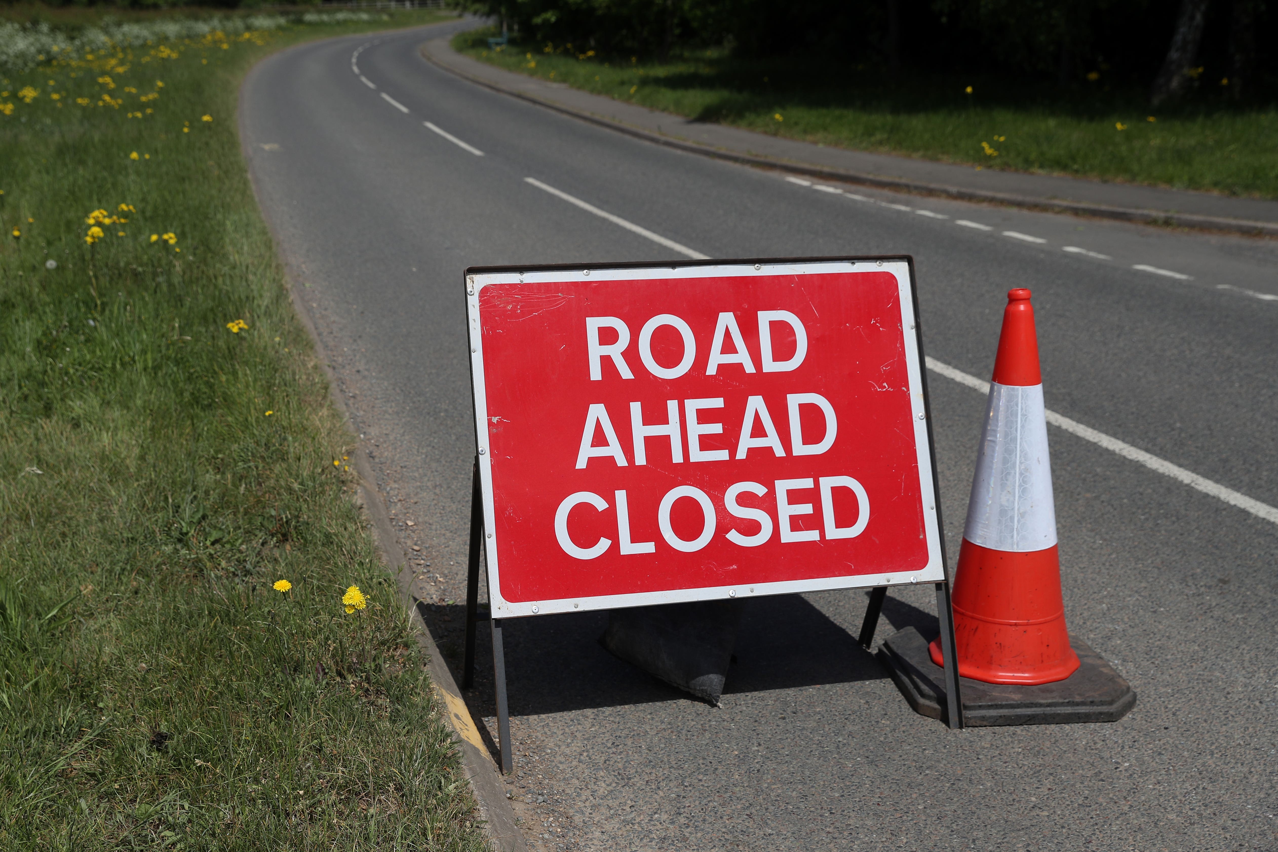 The road is likely to remain shut for some time, police said (PA)