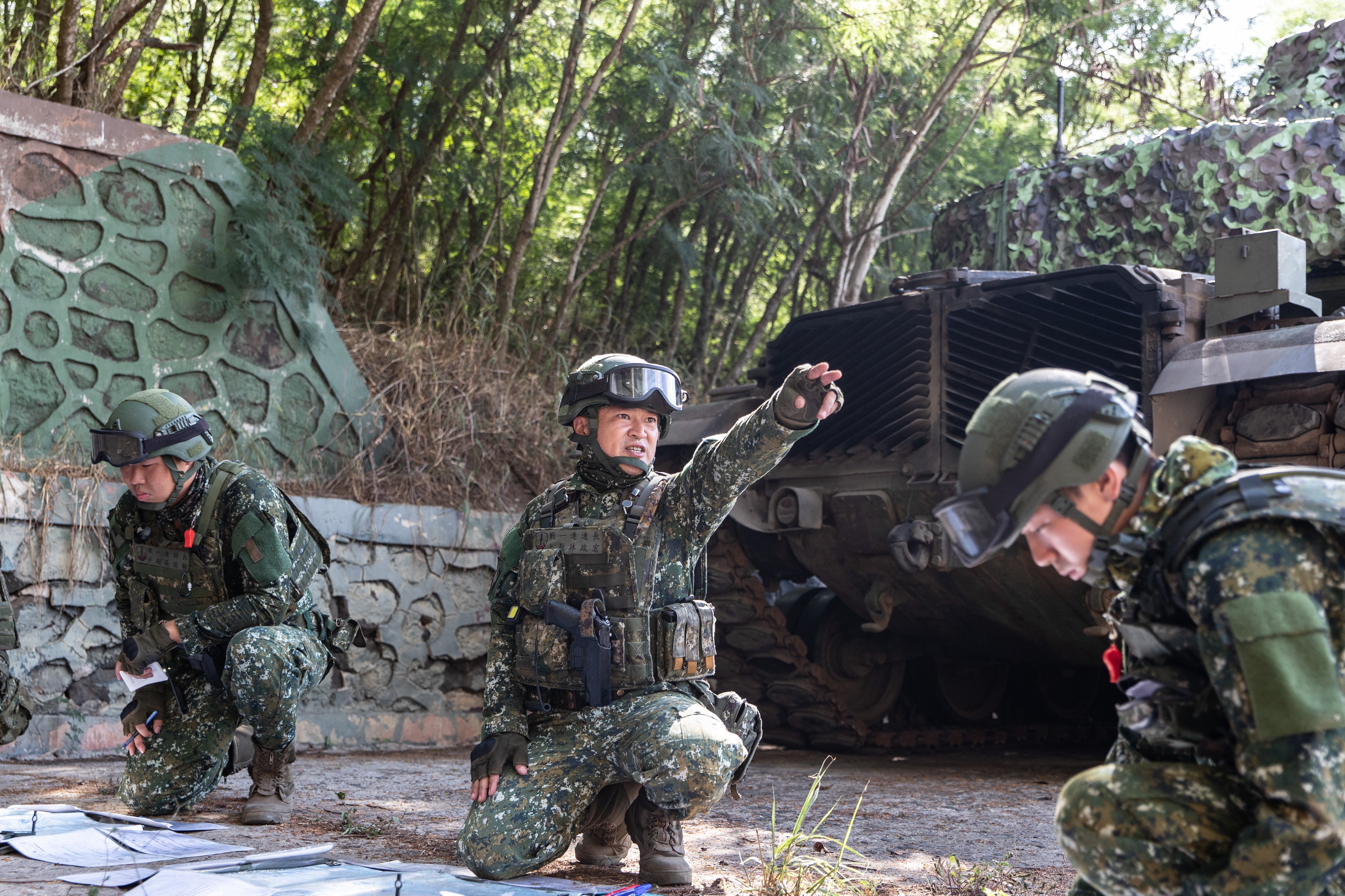 This handout photo taken and released on July 22, 2024 by the Taiwan Military News Agency shows Taiwanese soldiers taking part in drills during the annual Han Kuang Exercise on the Penghu Islands