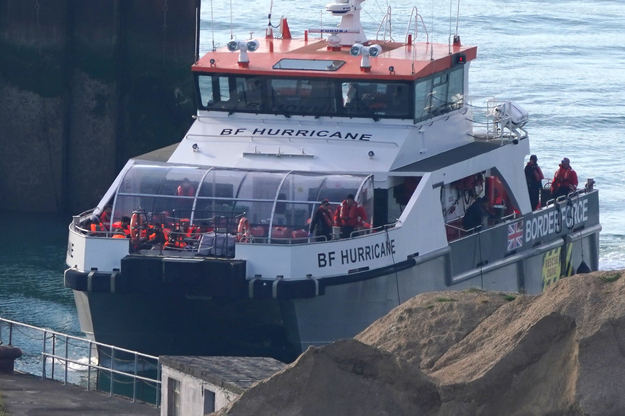 A group of people thought to be migrants are brought in to Dover on Saturday (Gareth Fuller/PA)