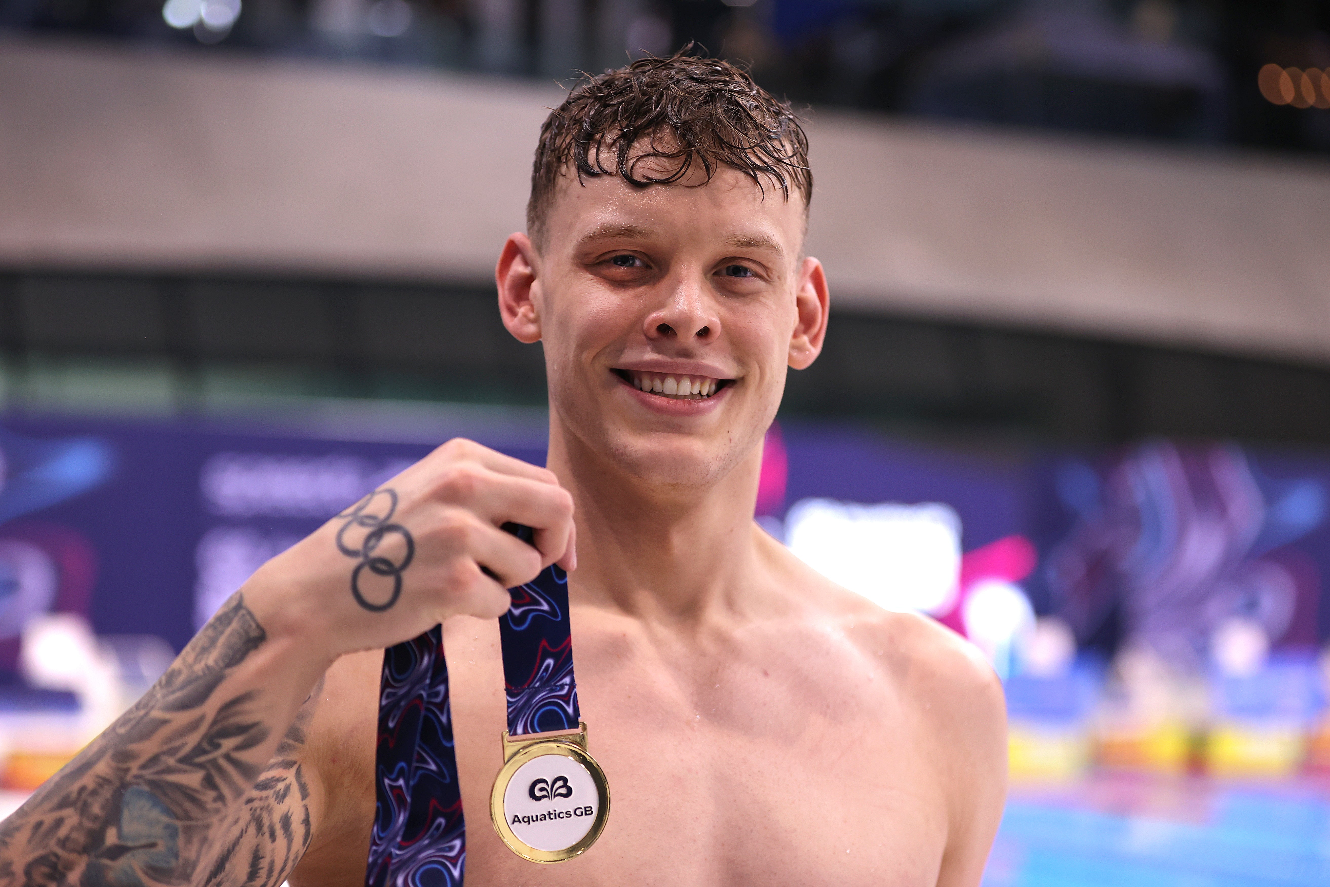 Matt Richards celebrates with his medal after winning the men’s 100m freestyle at the British Swimming Championships in April