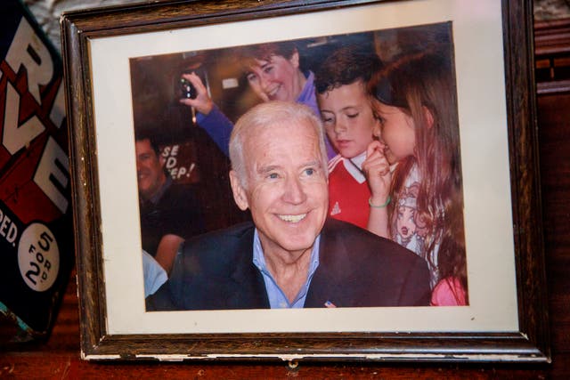 <p>Image of President Joe Biden during a visit as Vice President, hangs above the bar of Fitzpatrick's Restaurant in Co. Louth, Ireland</p>