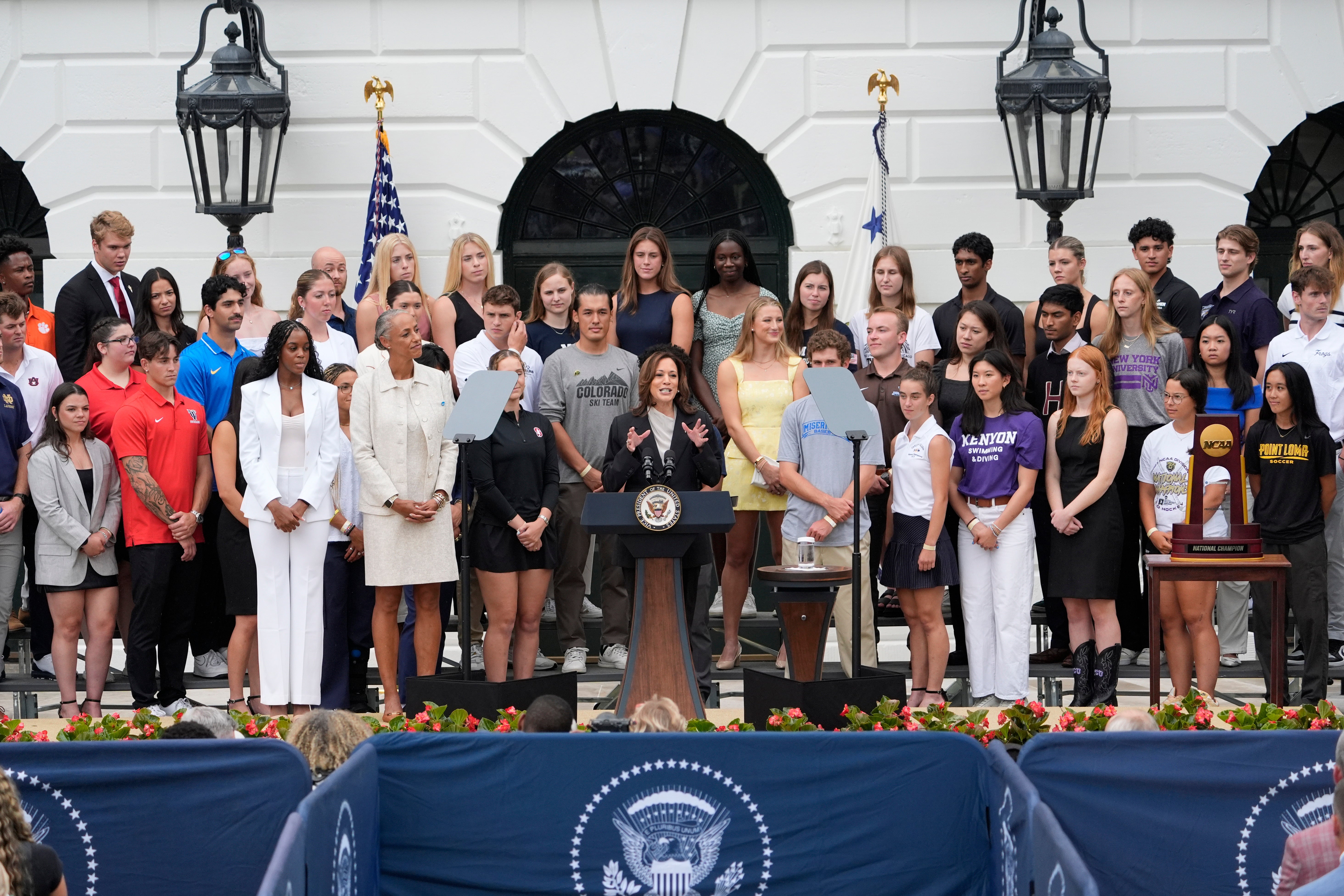 Vice President Kamala Harris speaks from the South Lawn of the White House in Washington, Monday, July 22, 2024, during an event with NCAA college athletes