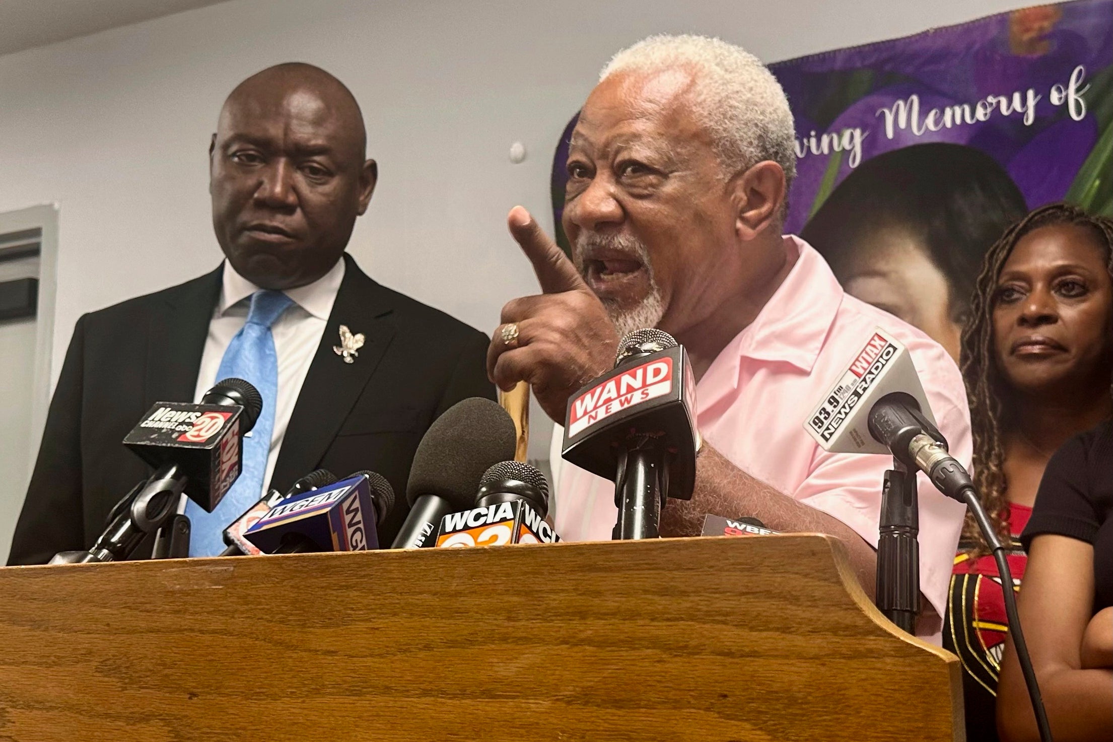 Sonya Massey’s father speaks at a press conference on Monday, as civil rights attorney Ben Crump (left) looks on.