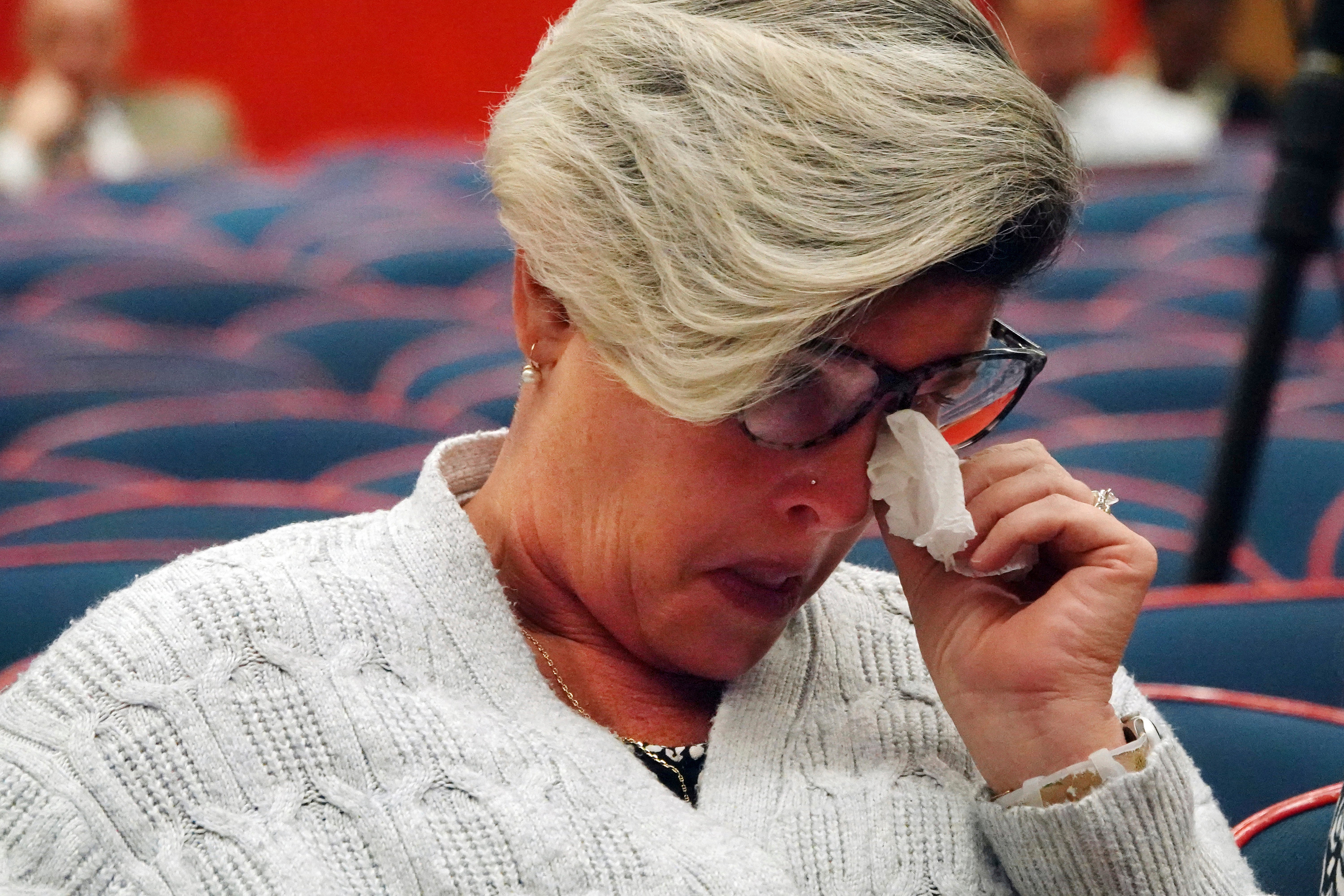 Jessica Norton, parent of a transgender student and volleyball player formerly of Monarch High School, reacts as the Broward County School Board discusses her daughter