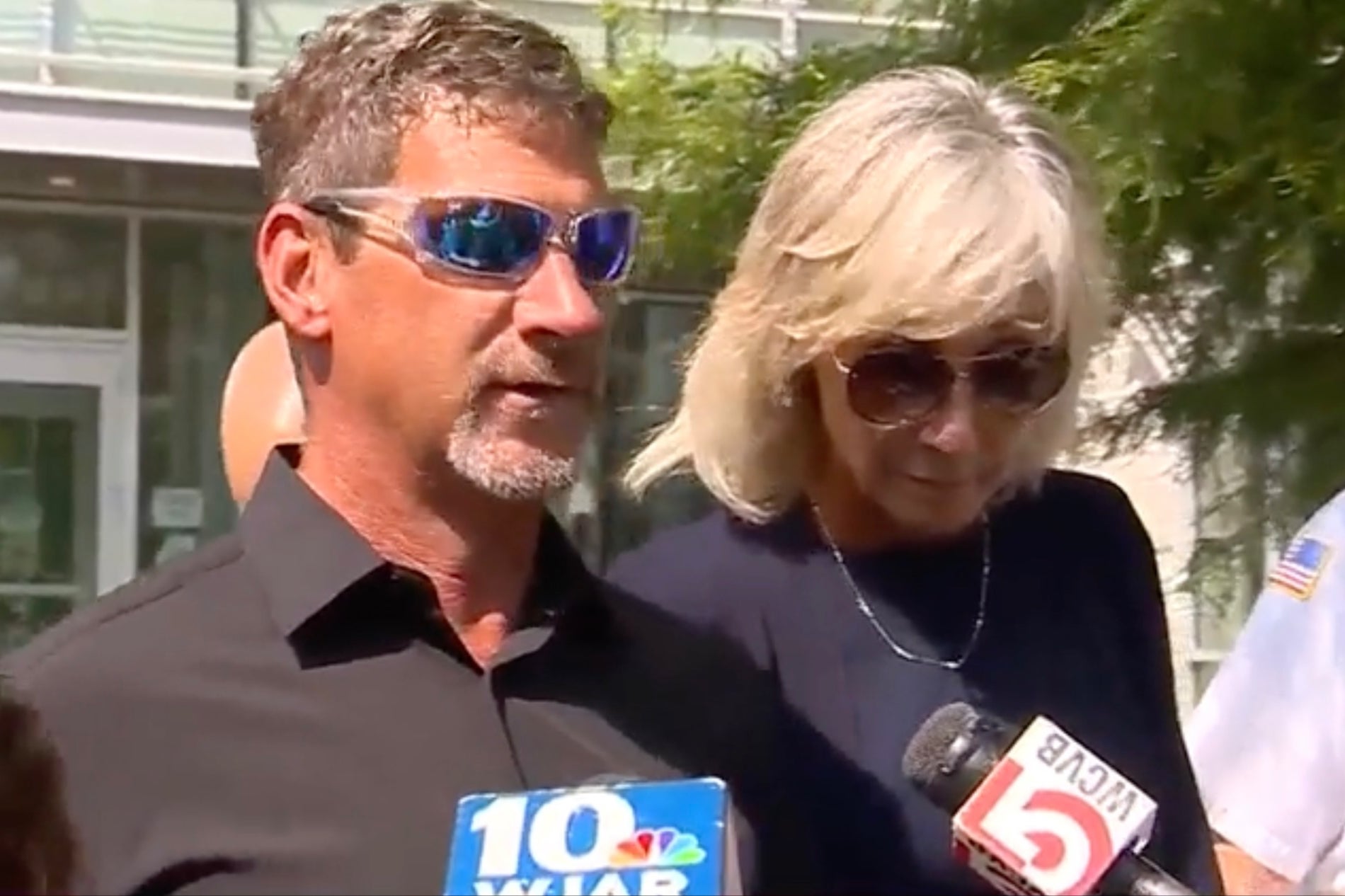 Ted, left, and Shaunna O’Connell, right, outside a Massachusetts courthouse on Monday after she was charged with assaulting her husband