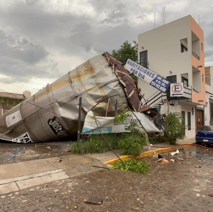 A photograph released by Jalisco authorities showed a damaged metallic container, crumpled after the explosion