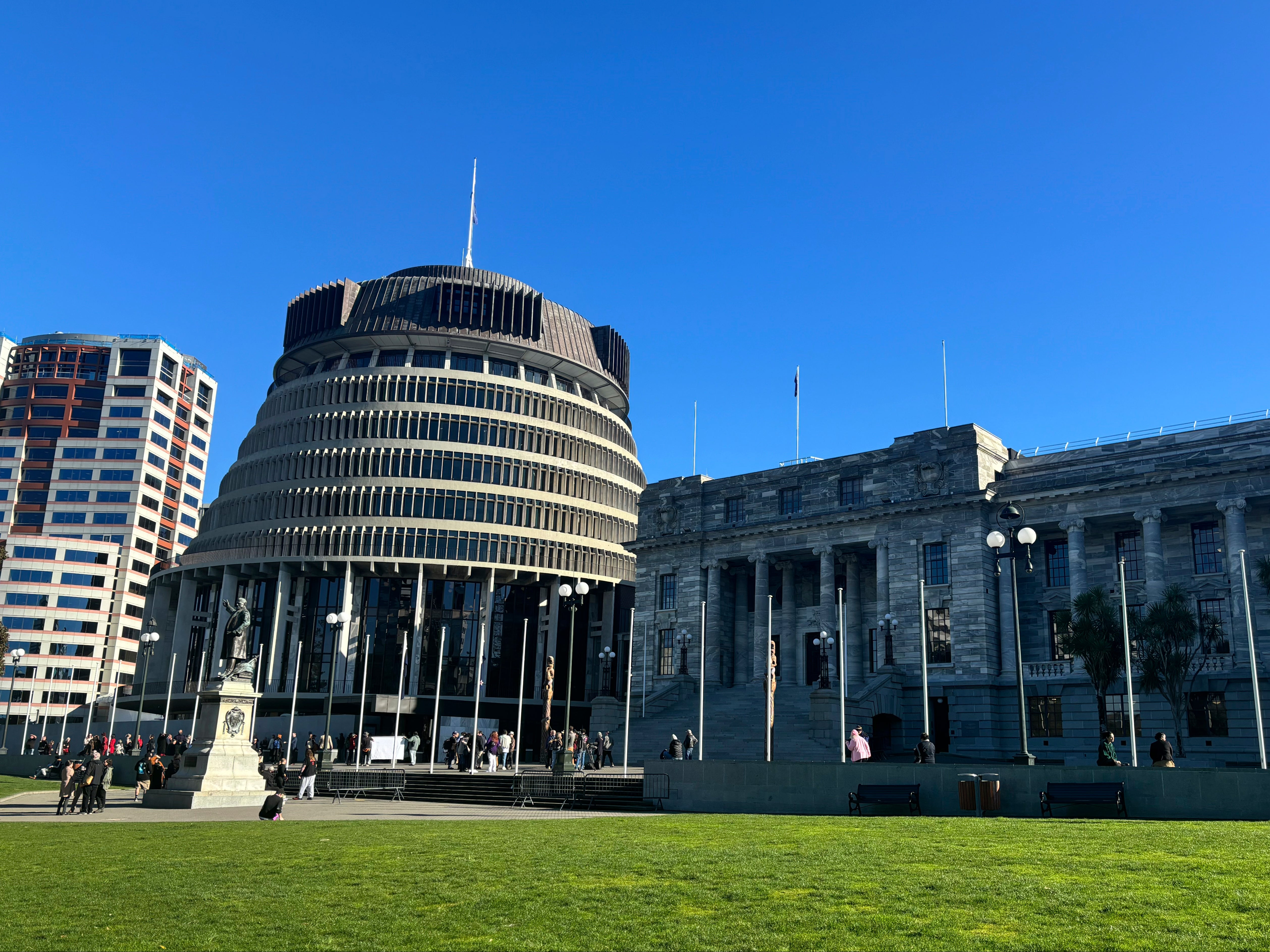 People arrive at the New Zealand parliament in Wellington for the tabling of the Abuse in Care Royal Commission report on 24 July 2024