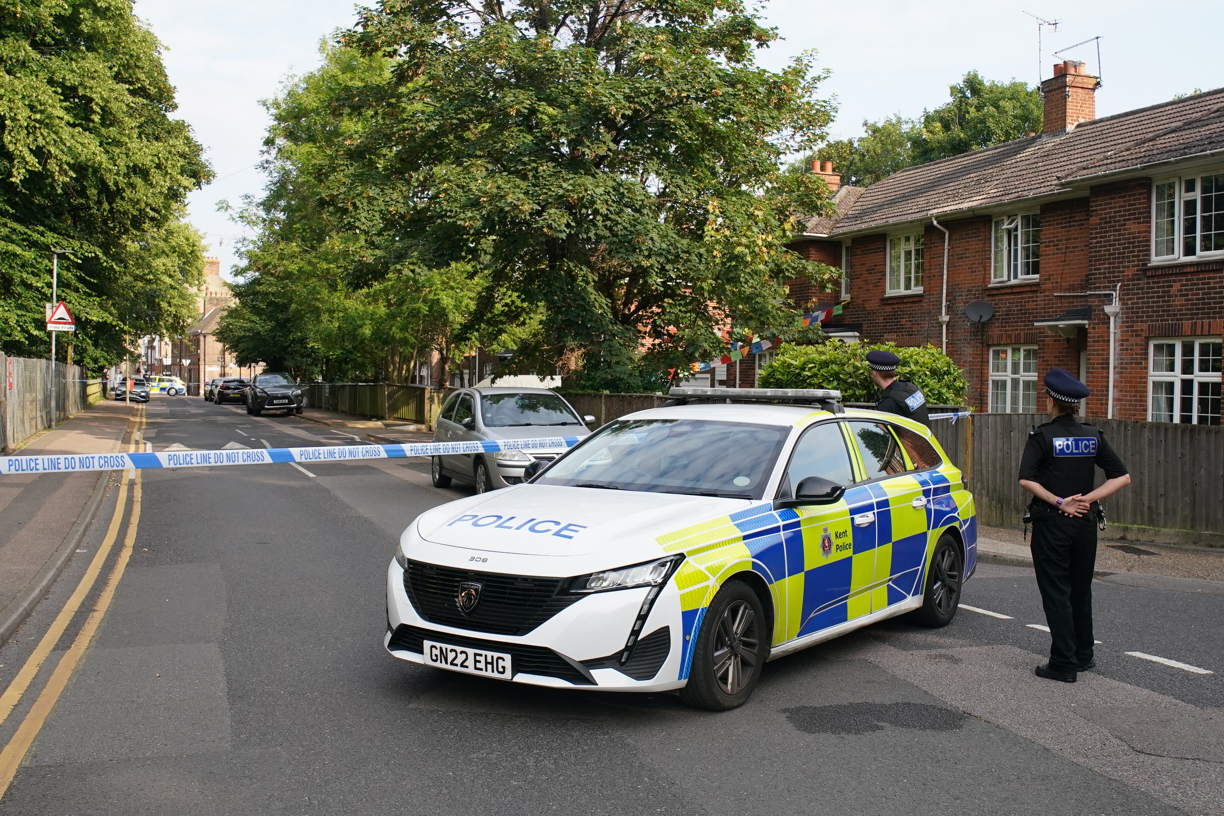 Officers at the scene in Sally Port Gardens