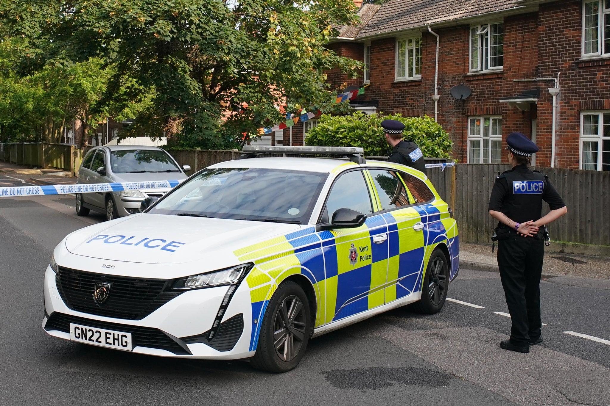 Officers at the scene in Sally Port Gardens