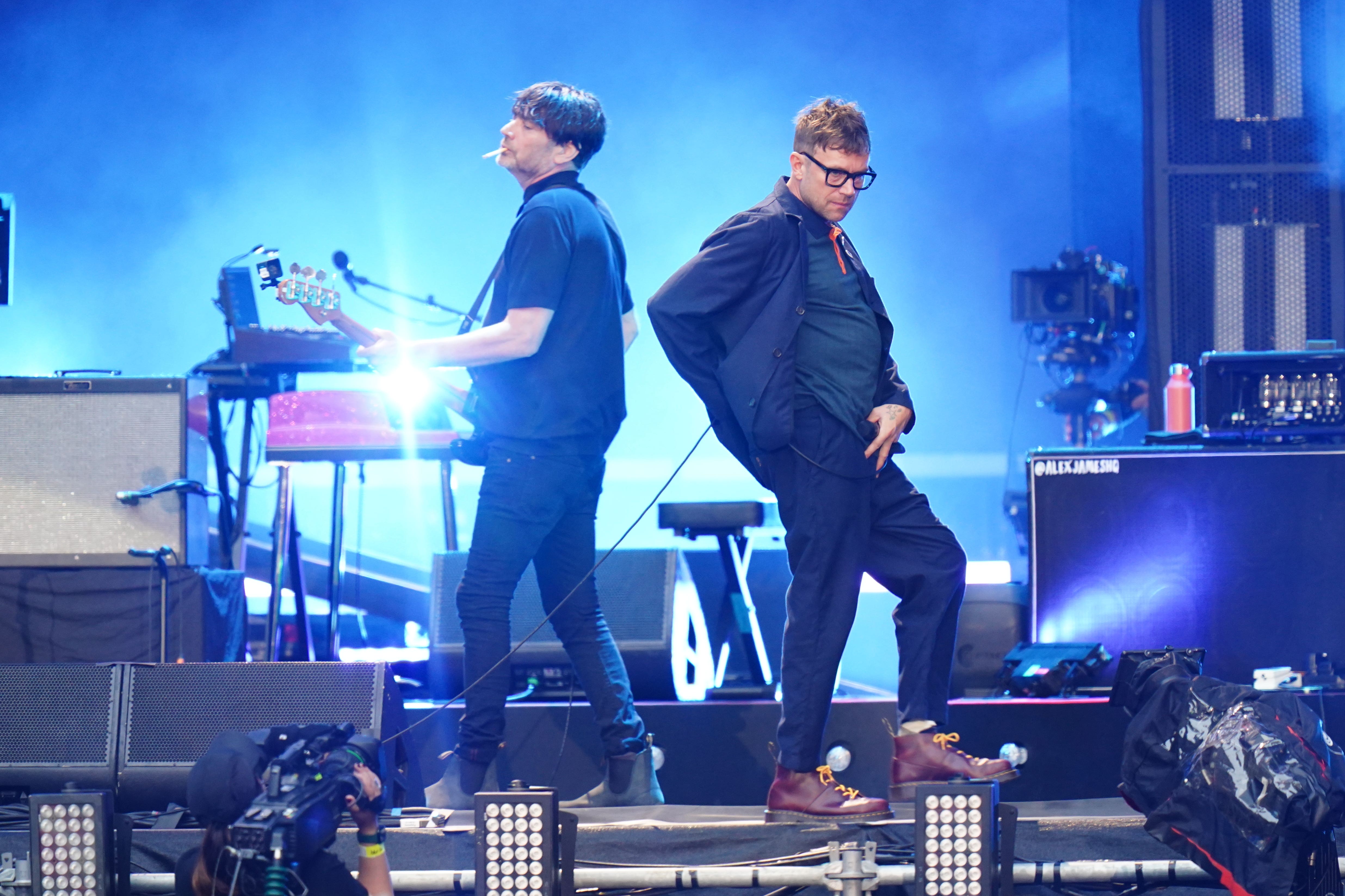 Alex James and Damon Albarn of Blur performing on stage at Wembley Stadium in London (Ian West/PA)