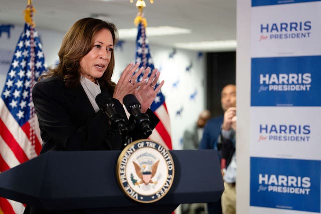 <p>Democratic presidential candidate Kamala Harris speaks at her campaign headquarters in Wilmington, Delaware, on July 22, 2024 with the new campaign signs next to her </p>