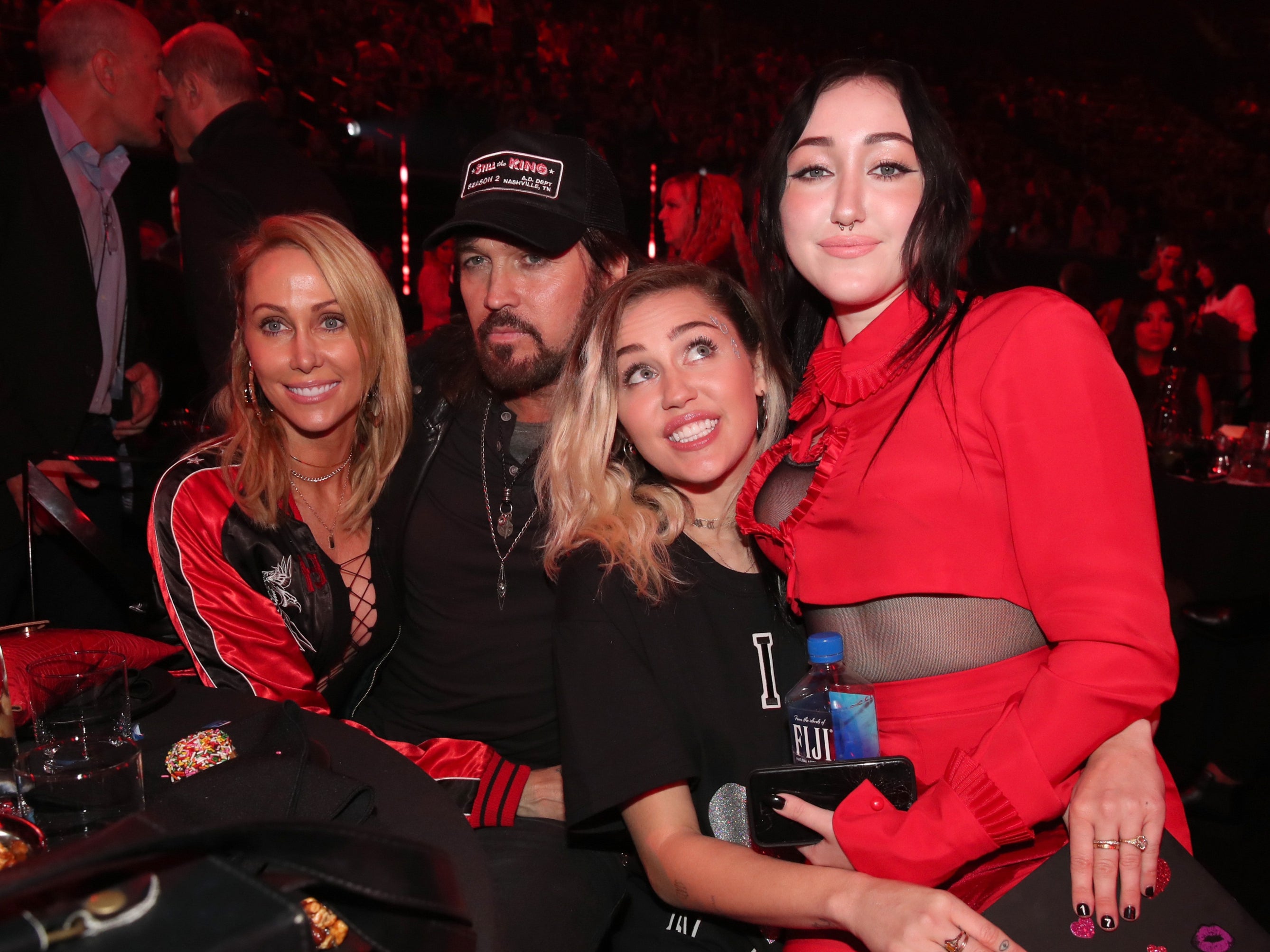 L-R: Trish, Billy Ray, Miley and Noah Cyrus at the iHeartRadio Music Awards in 2017