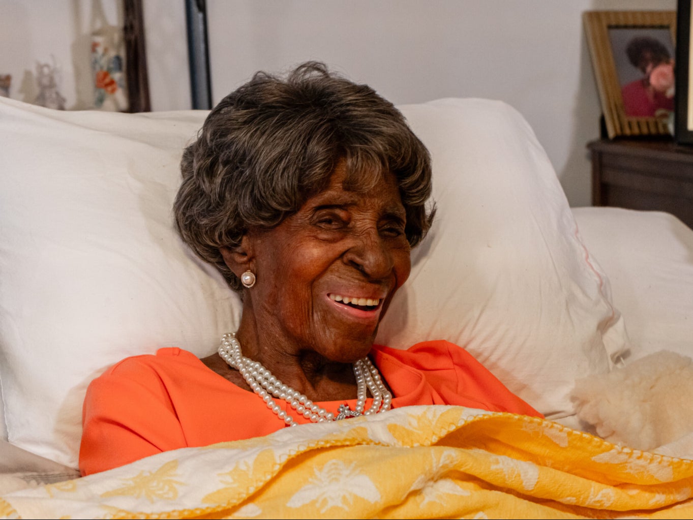 Elizabeth Francis, pictured here lying in her bed, became the oldest living American in July when she turned 115-years-old