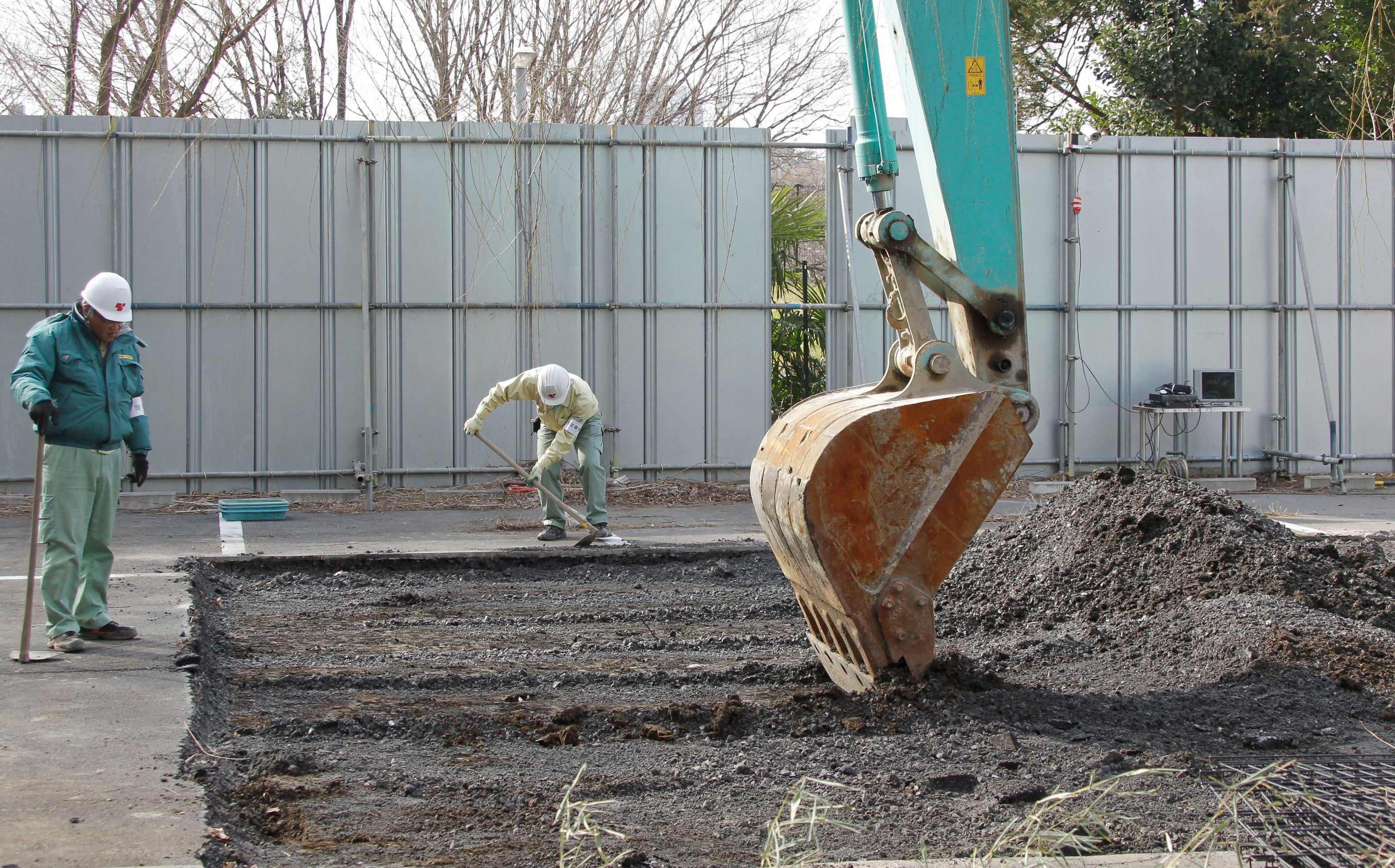 A power shovel is used on Feb. 21, 2011 to dig the site of a former medical school