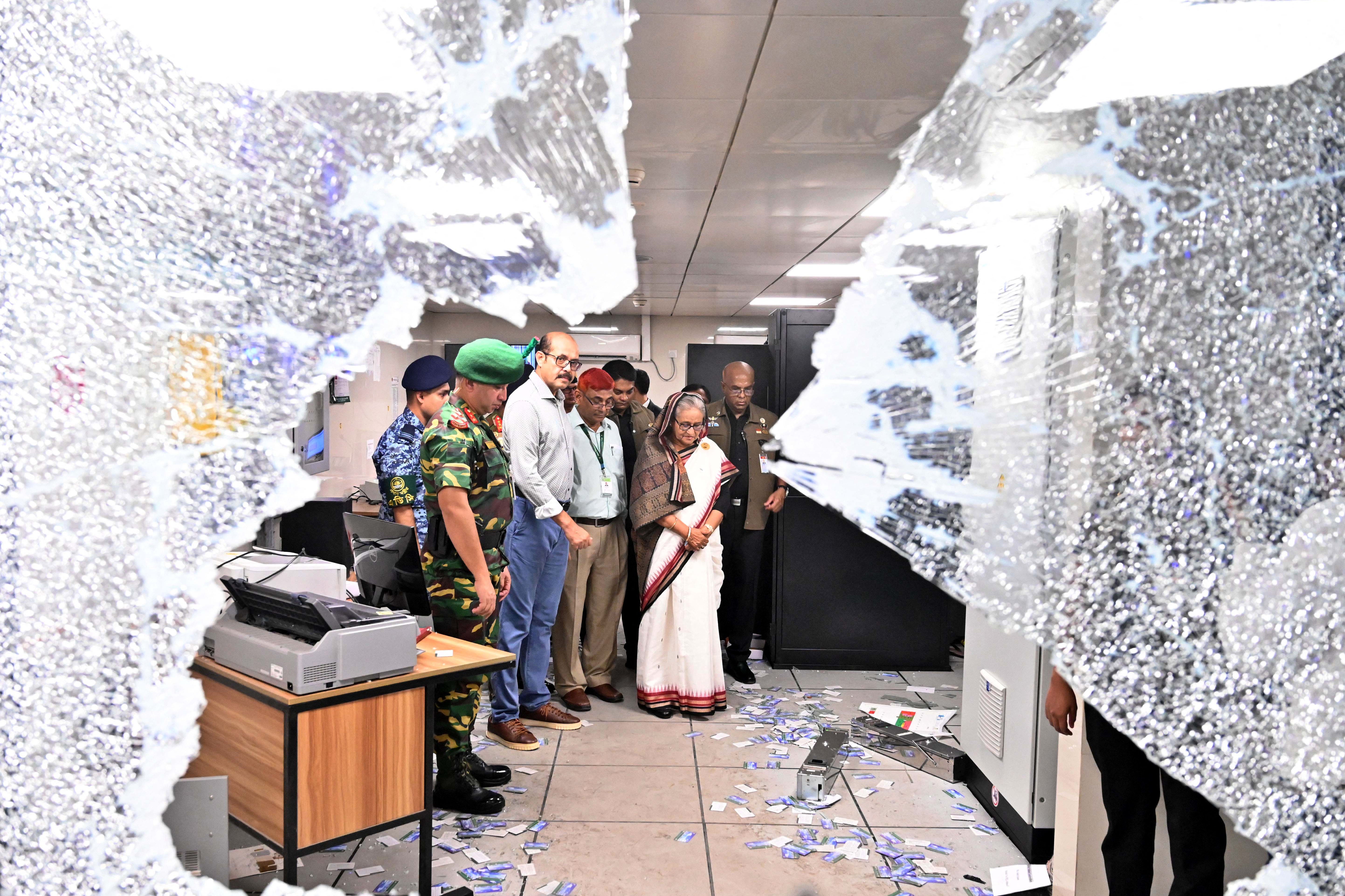 Hasina views the damage that was caused to the metro station in Mirpur during the protest