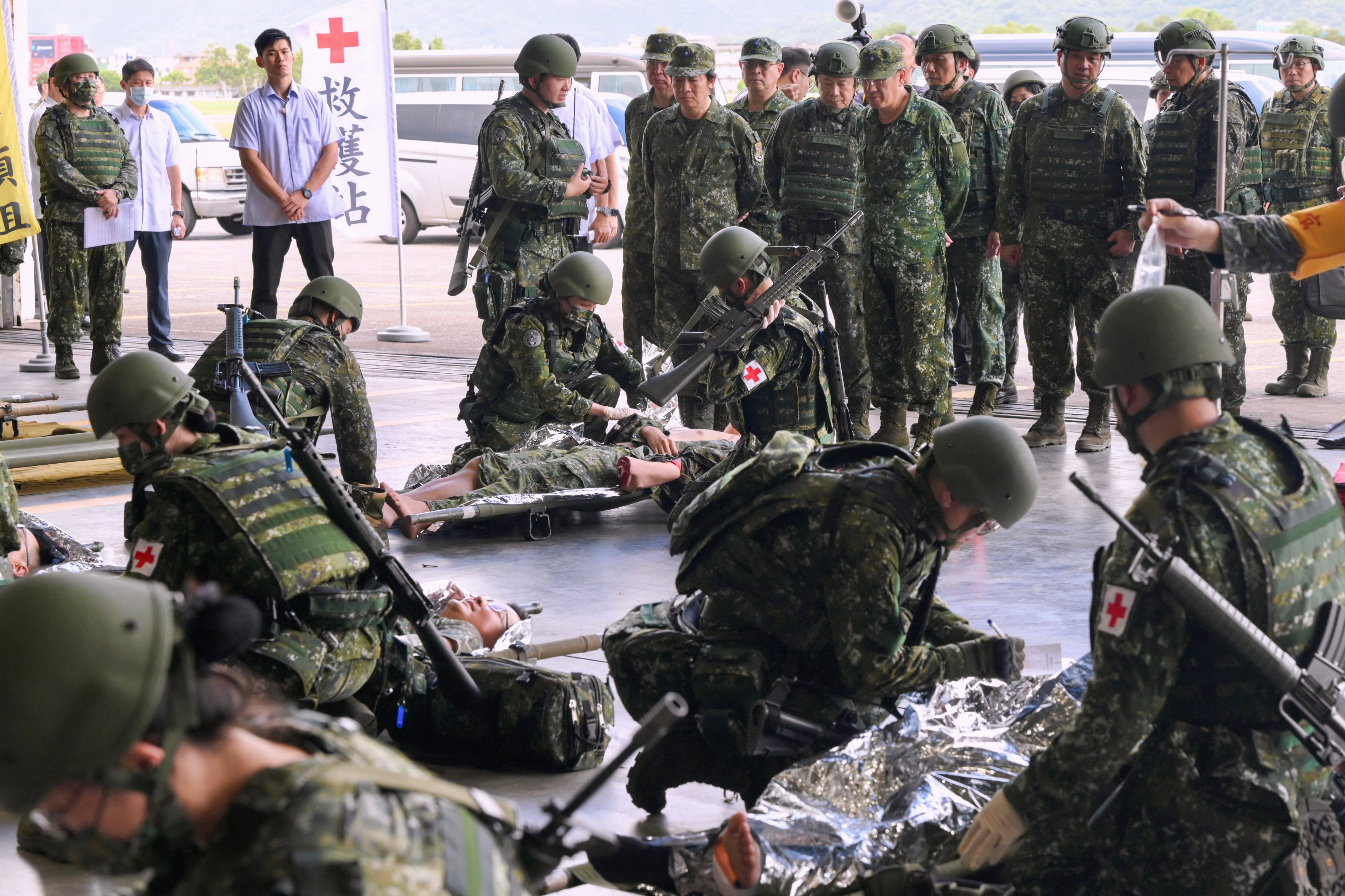 Taiwan president Lai Ching-te (centre) watches a simulated mass casualty rescue exercise