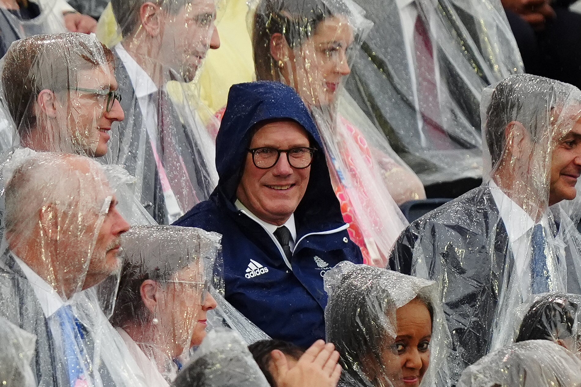 Prime Minister Sir Keir Starmer shelters from the the rain at the Trocadero during the opening ceremony of the Paris 2024 Olympic Games (Mike Egerton/PA).