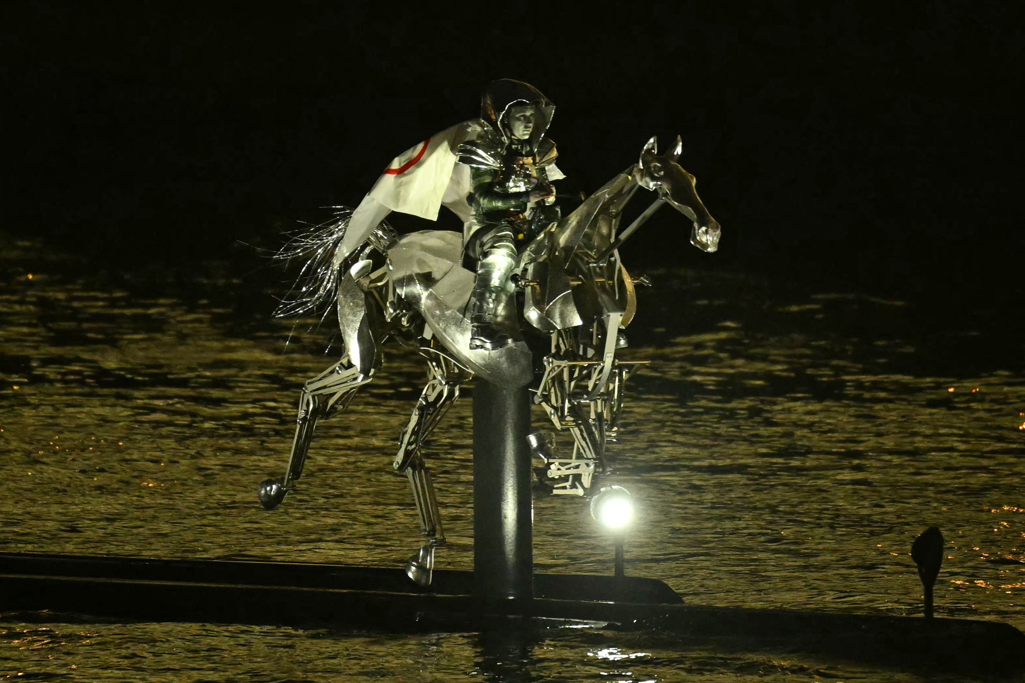 Reining it in: An animatronic horse gallops down the Seine