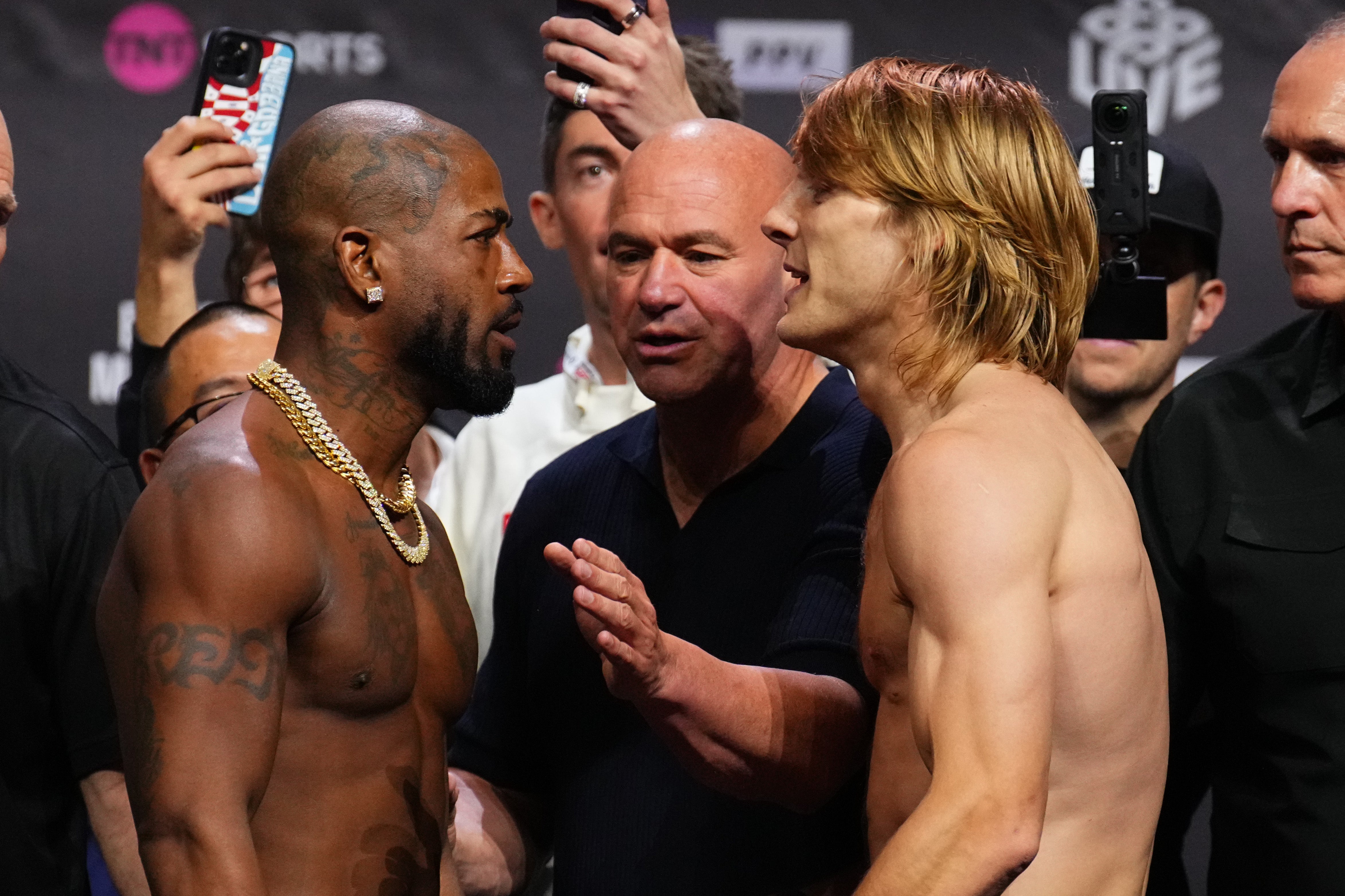 Paddy Pimblett (right) facing off with Bobby King Green