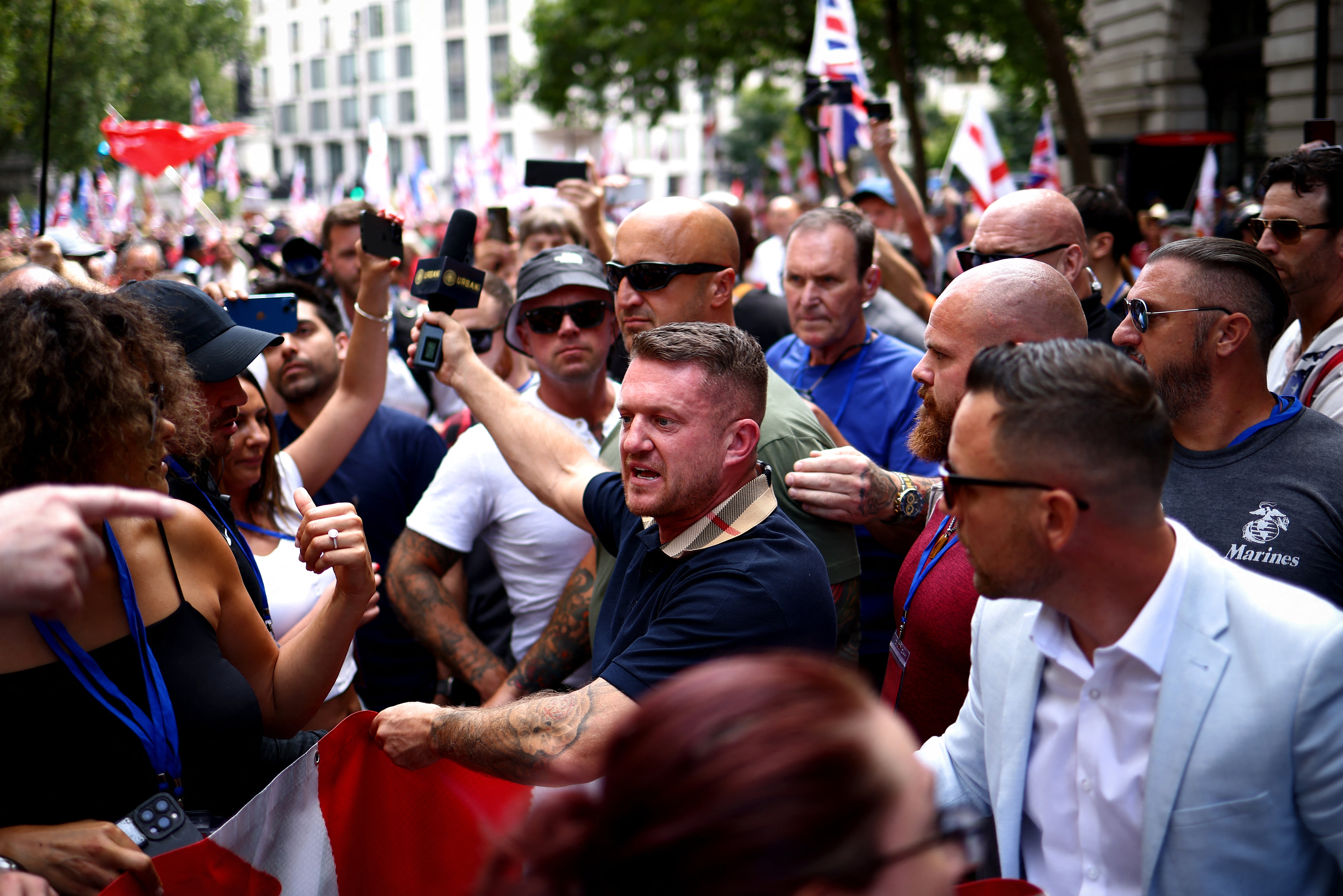 British far-right activist Stephen Yaxley-Lennon, also known as Tommy Robinson marches with supporters in central London in July