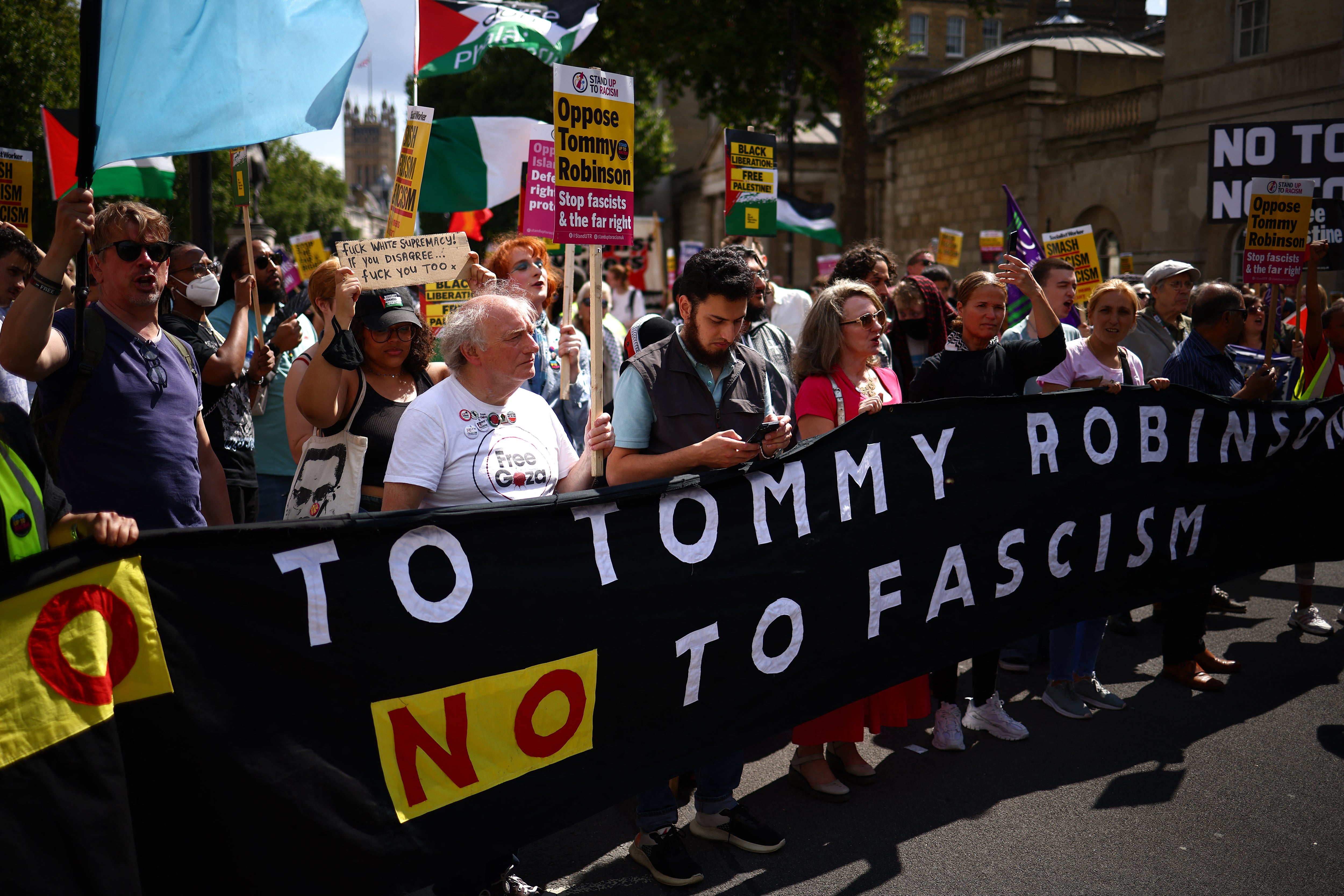 People take part in a counterdemonstration against British far-right protesters on Saturday