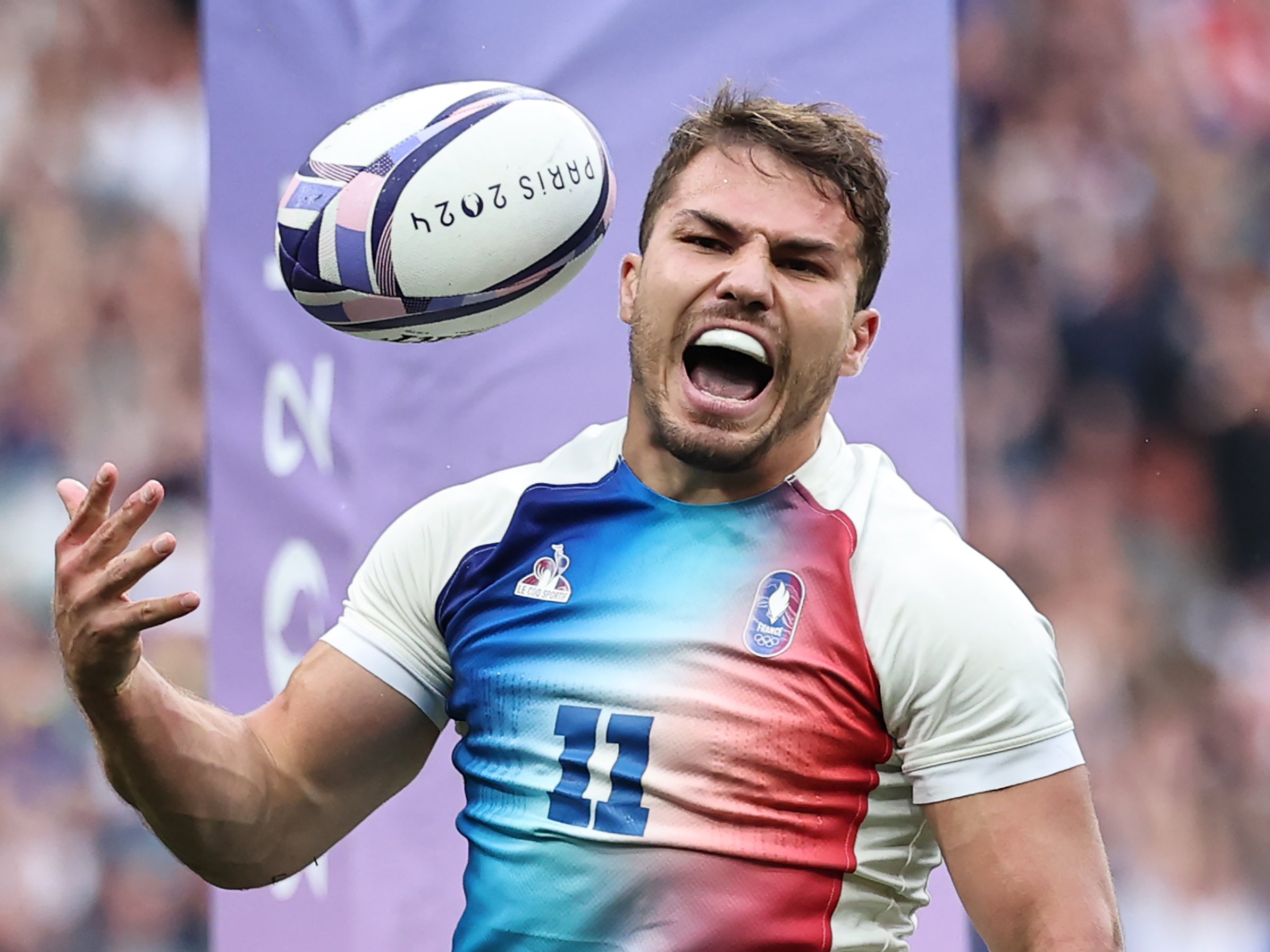 Antoine Dupont of France celebrates scoring