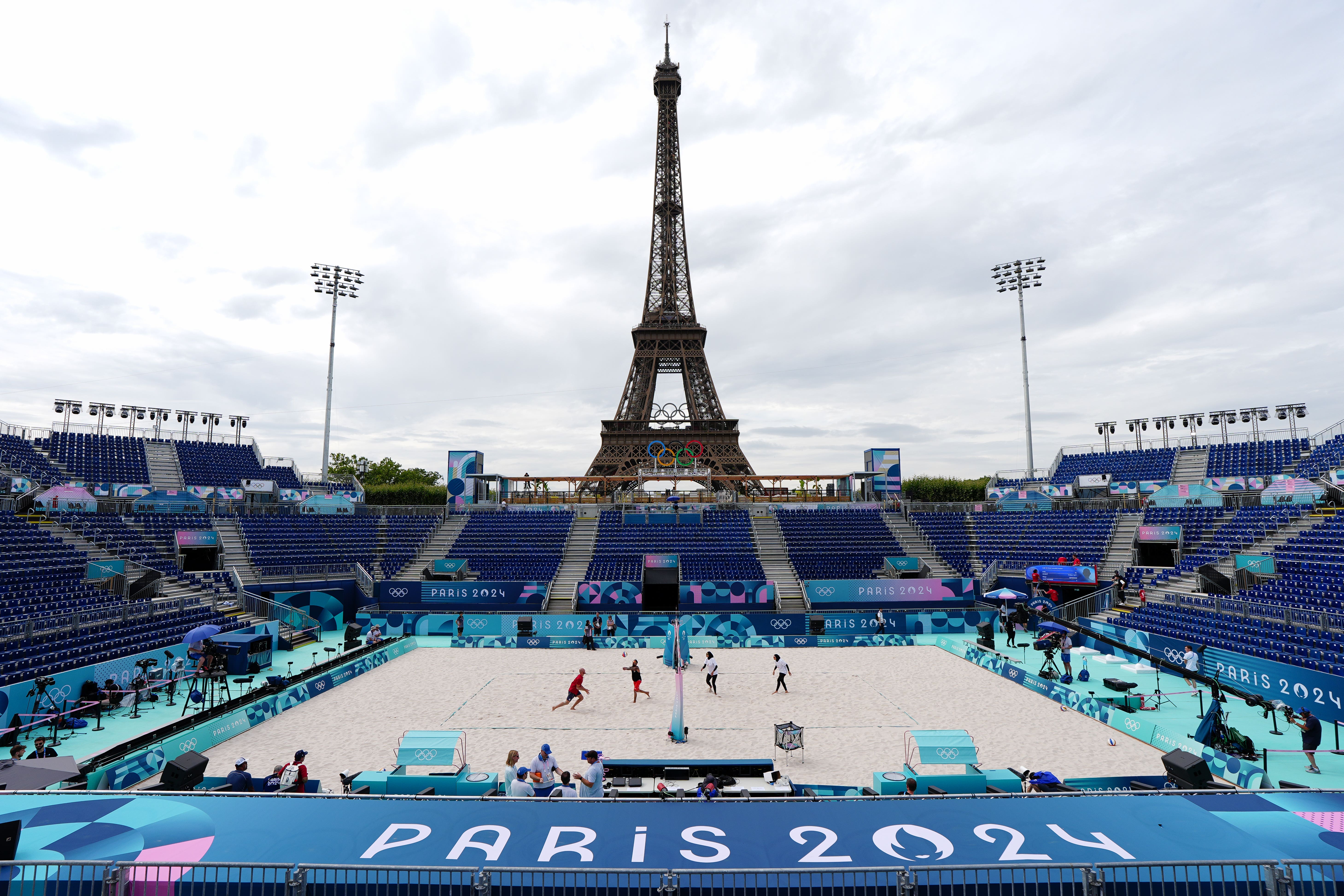 Dark clouds hovered over the opening day of the beach volleyball competition in Paris (David Davies/PA)