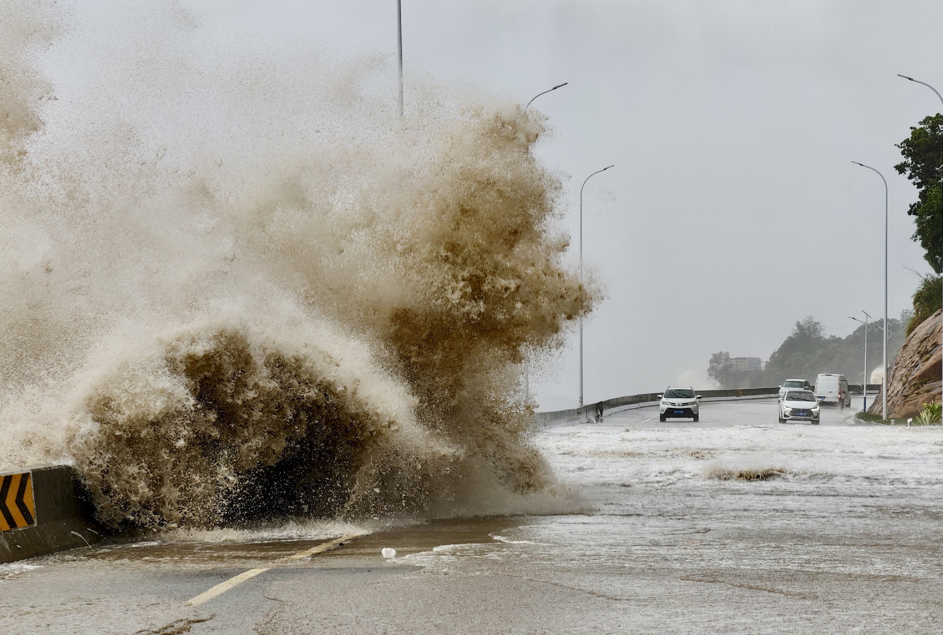 File: Waves crash on the coast of Sansha town as Typhoon Gaemi approaches, in Ningde, Fujian province, China on 25 July 2024