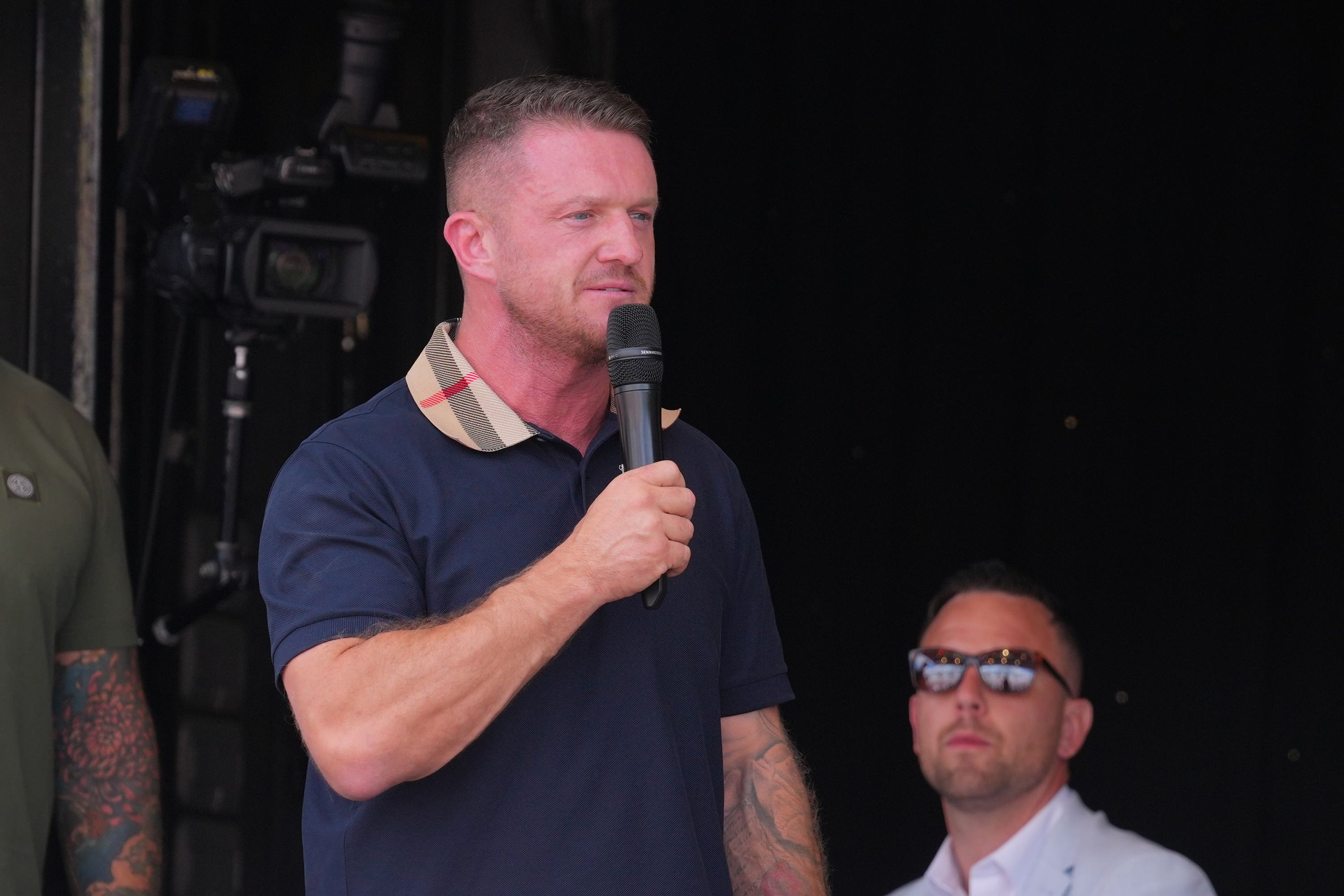 Tommy Robinson addresses the crowd gathered at Trafalgar Square