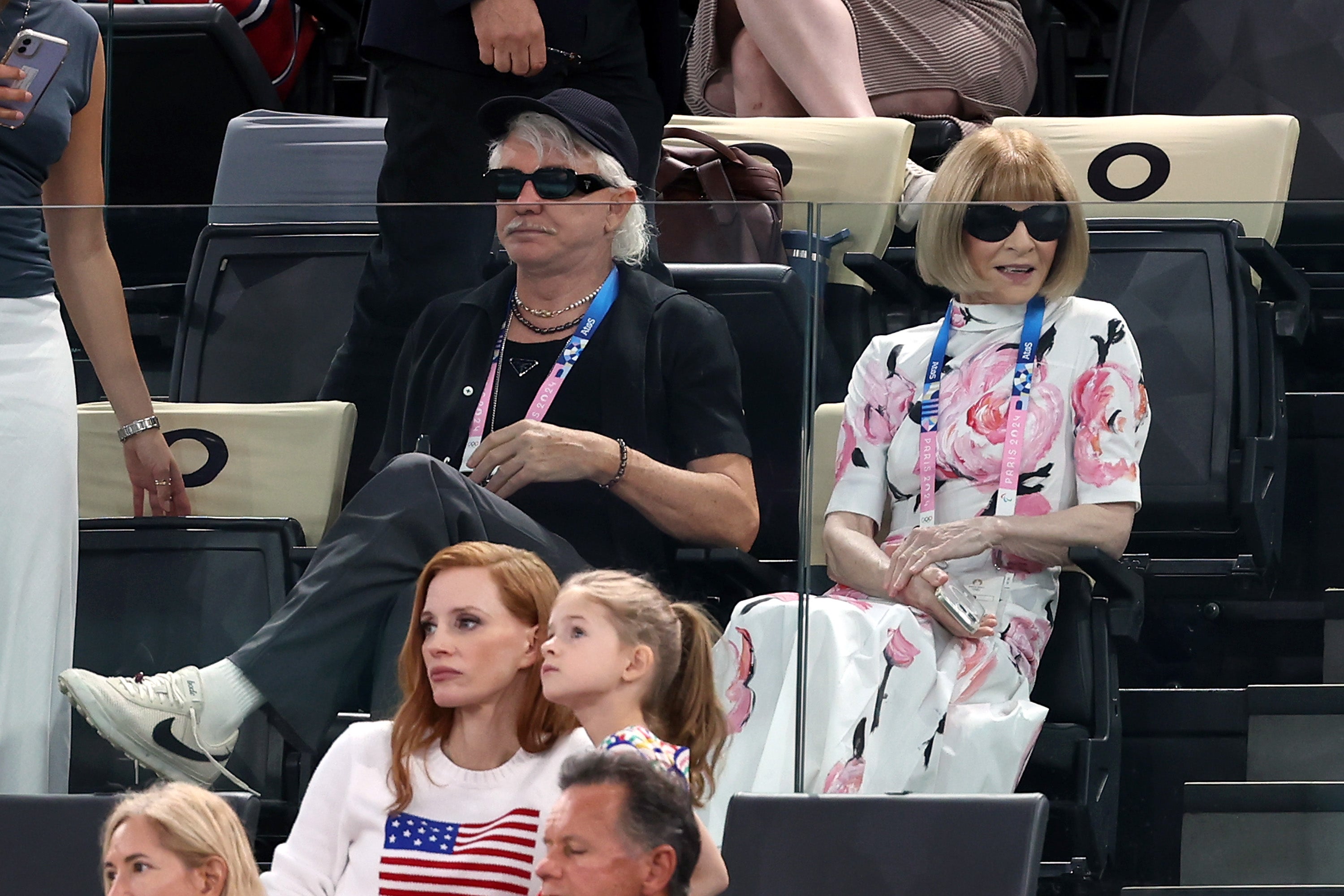 Vogue editor Anna Wintour and film director Baz Luhrmann, with actor and producer Jessica Chastain in fron