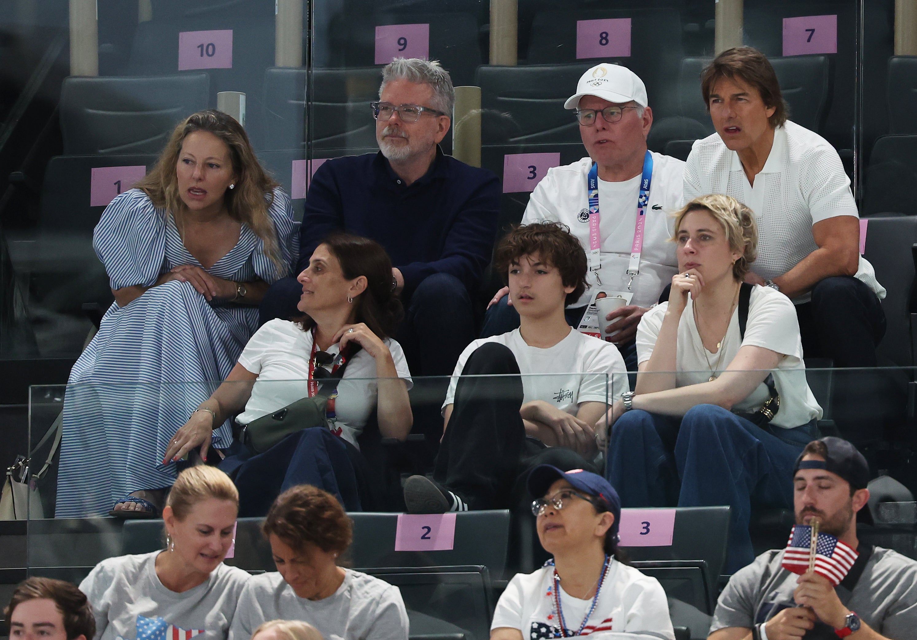 om Cruise (R), David Zaslav (2nd-R) and Greta Gerwig (2nd row, R)