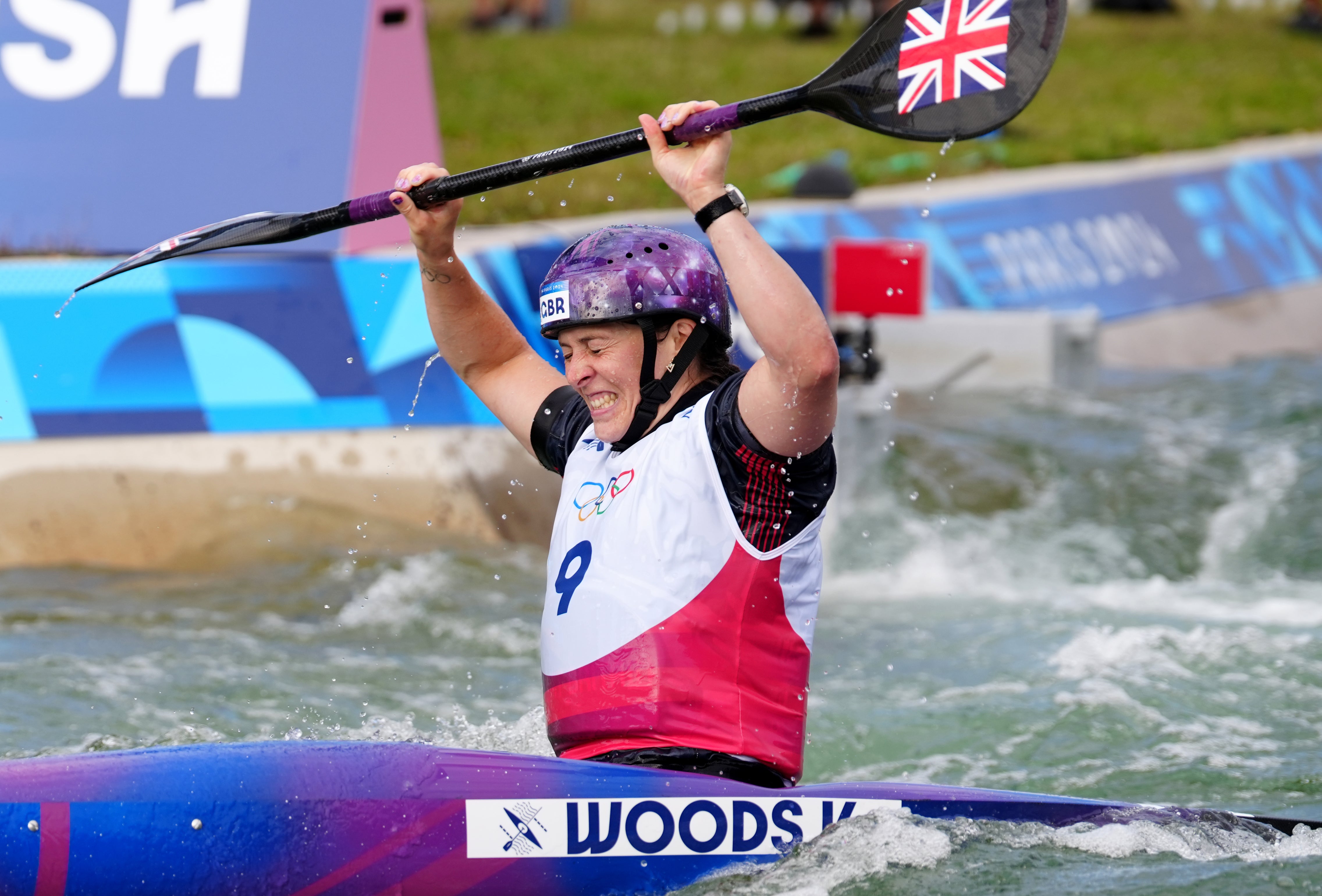 Great Britain’s Kimberley Woods reacts as she crosses the finish line in the women’s kayak single final at the Paris Olympics (David Davies/PA).