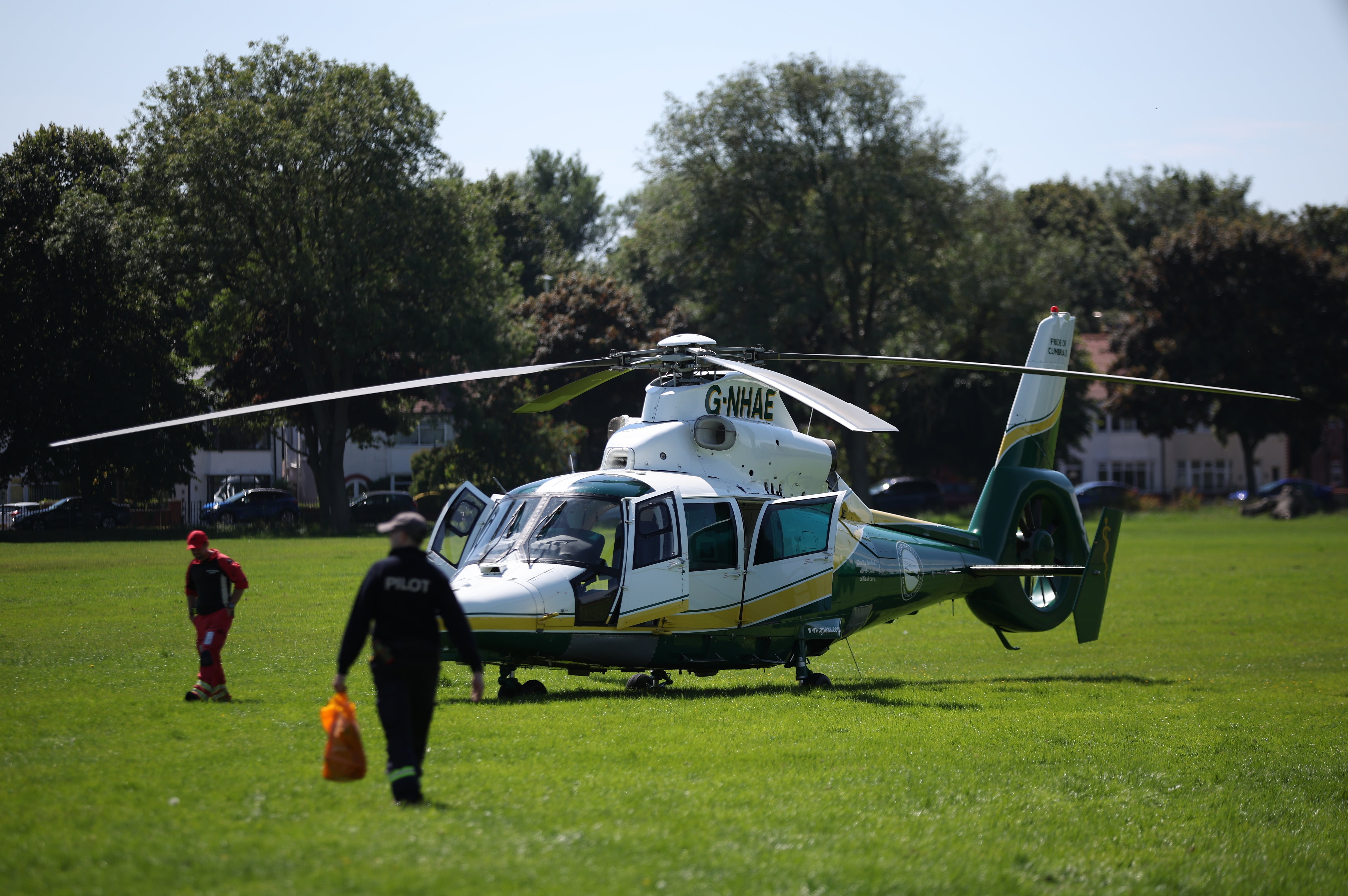 A helicopter lands at the scene