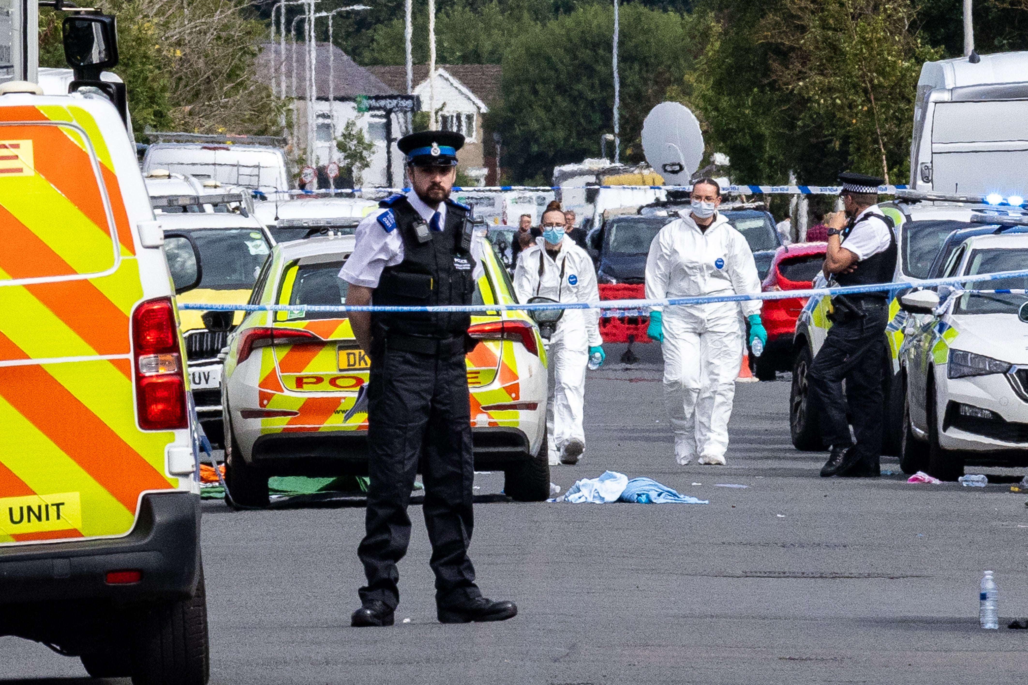 Forensic officers seen at the scene on Hart Street in the hours after the incident