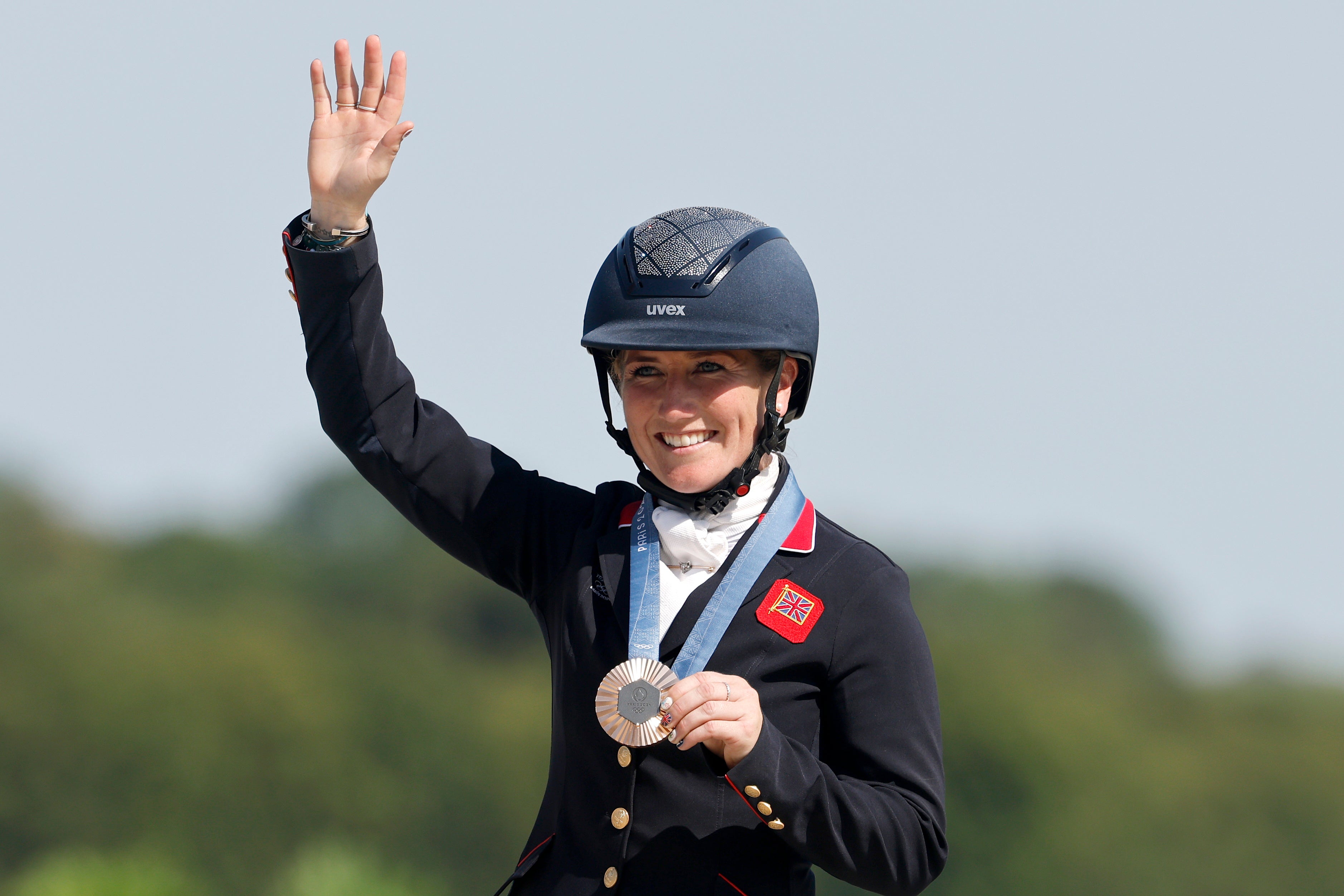 Laura Collett of Great Britain during the medal ceremony for the Eventing Jumping Individual