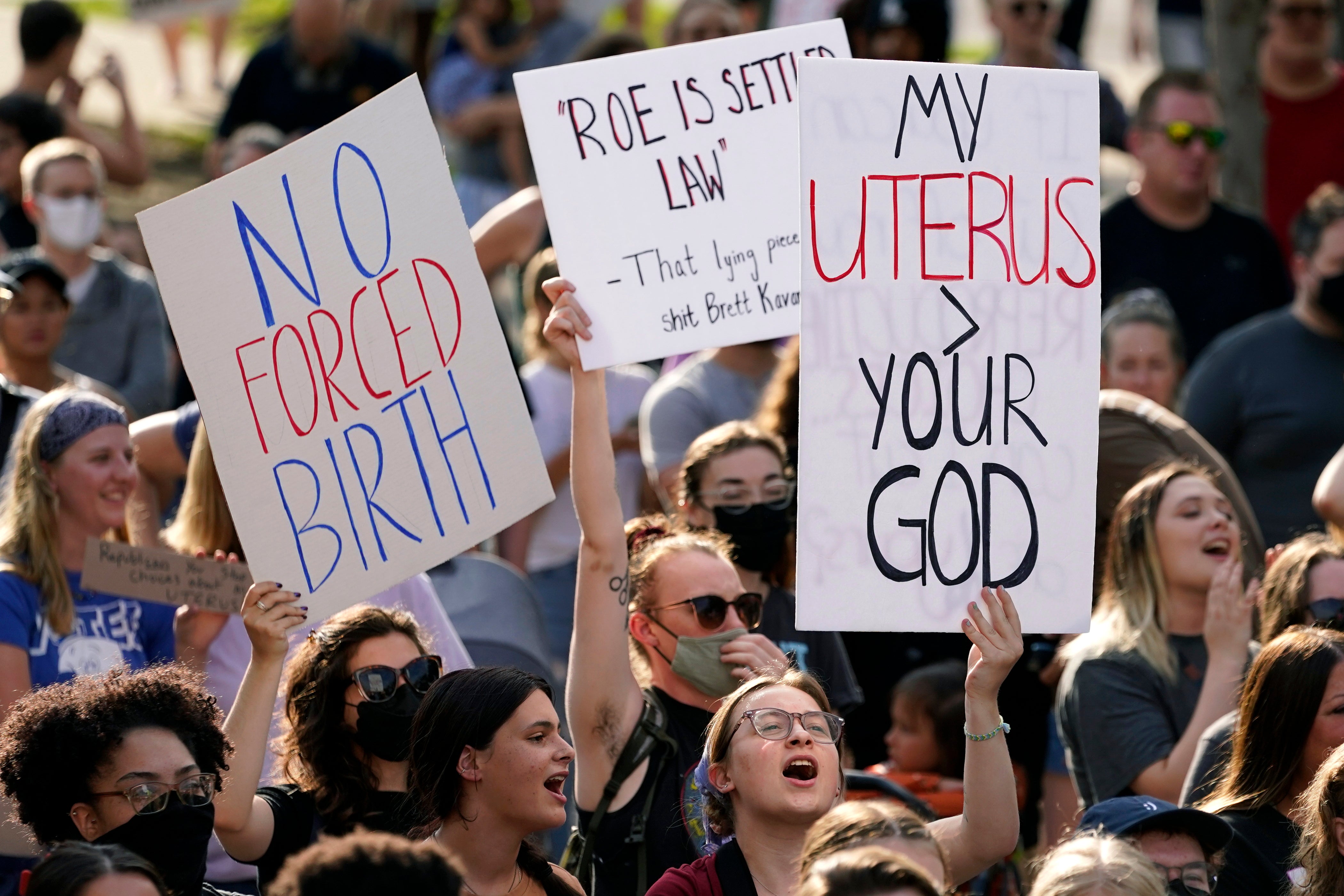 Abortion rights protesters in 2022 fighting for reproductive access in Iowa. Today, the state’s six-week abortion ban started