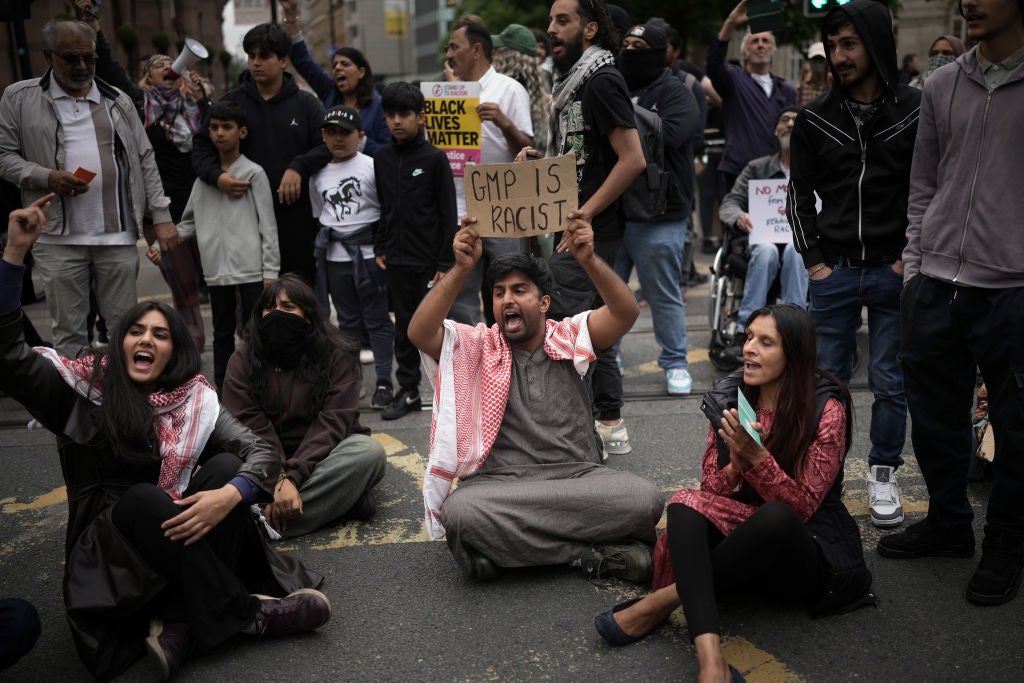 Protestors block tram tracks during demonstrations after video from the airport incident emerged