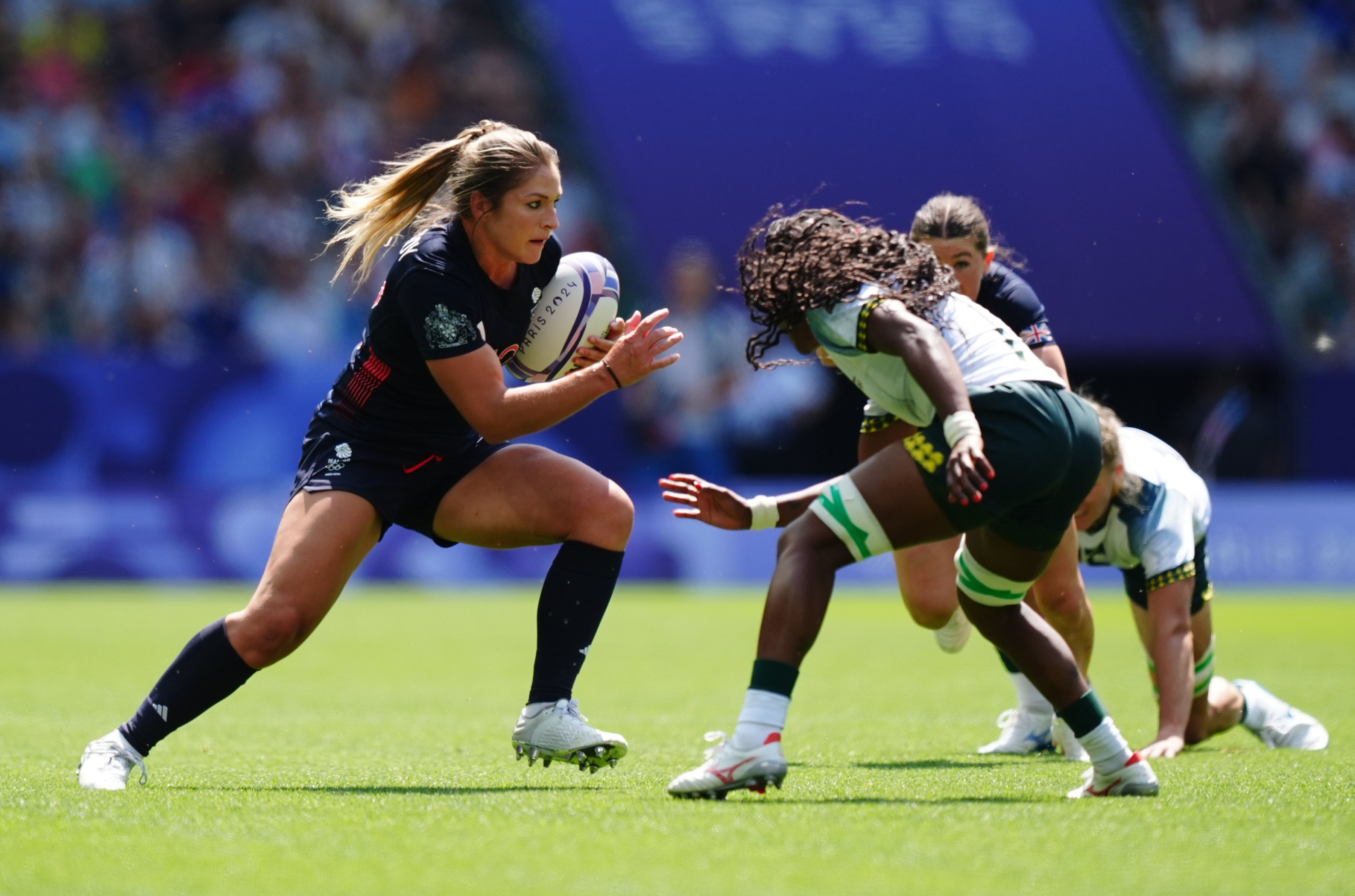 Great Britain's Amy Wilson-Hardy (left) in action against South Africa during the women's rugby sevens match at Stade de France