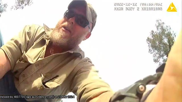 <p>Conspiracy theorists Gareth Train is recorded by a police body camera on Dec. 12, 2022, at a rural property at Wieambilla, Australia</p>