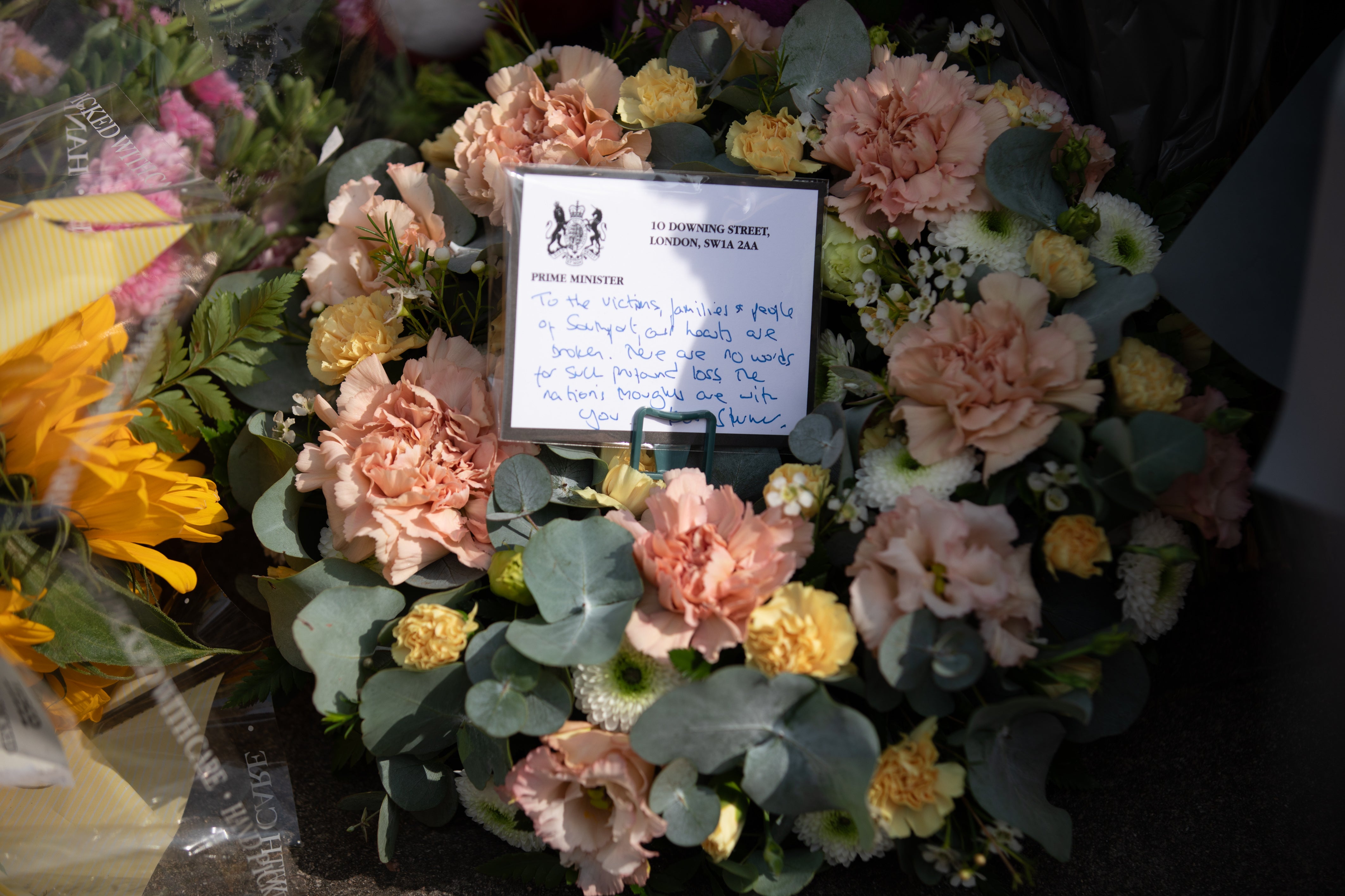 Floral tributes left at the scene by Starmer