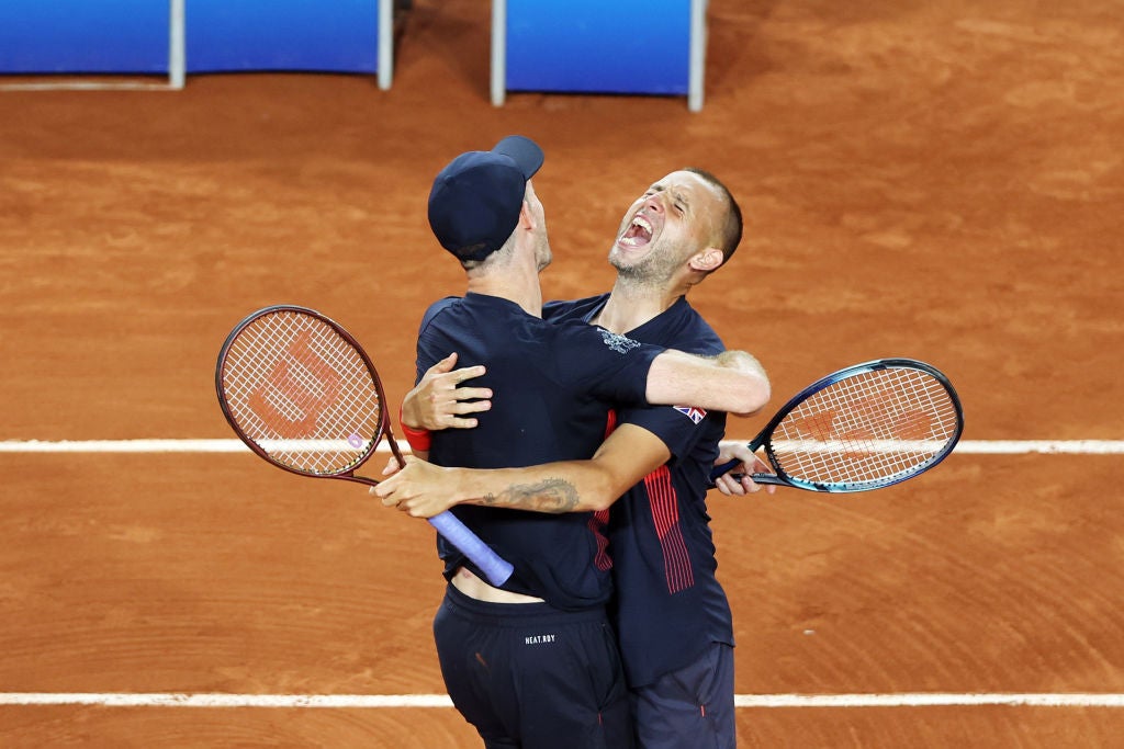 Evans celebrates a latest victory alongside Murray in the Olympic doubles tournament