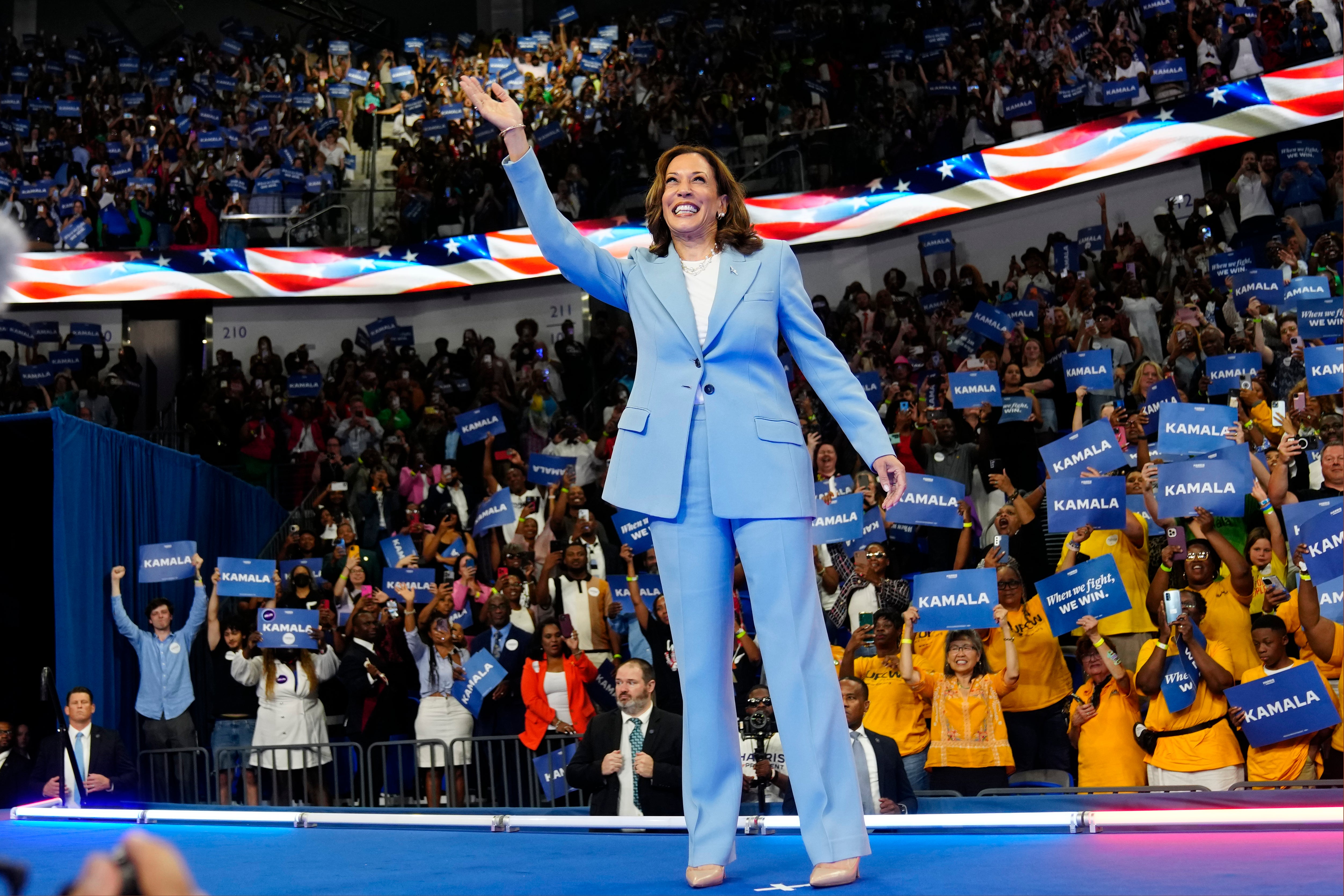 Vice President Kamala Harris waves during a campaign rally, Tuesday, July 30, 2024, in Atlanta