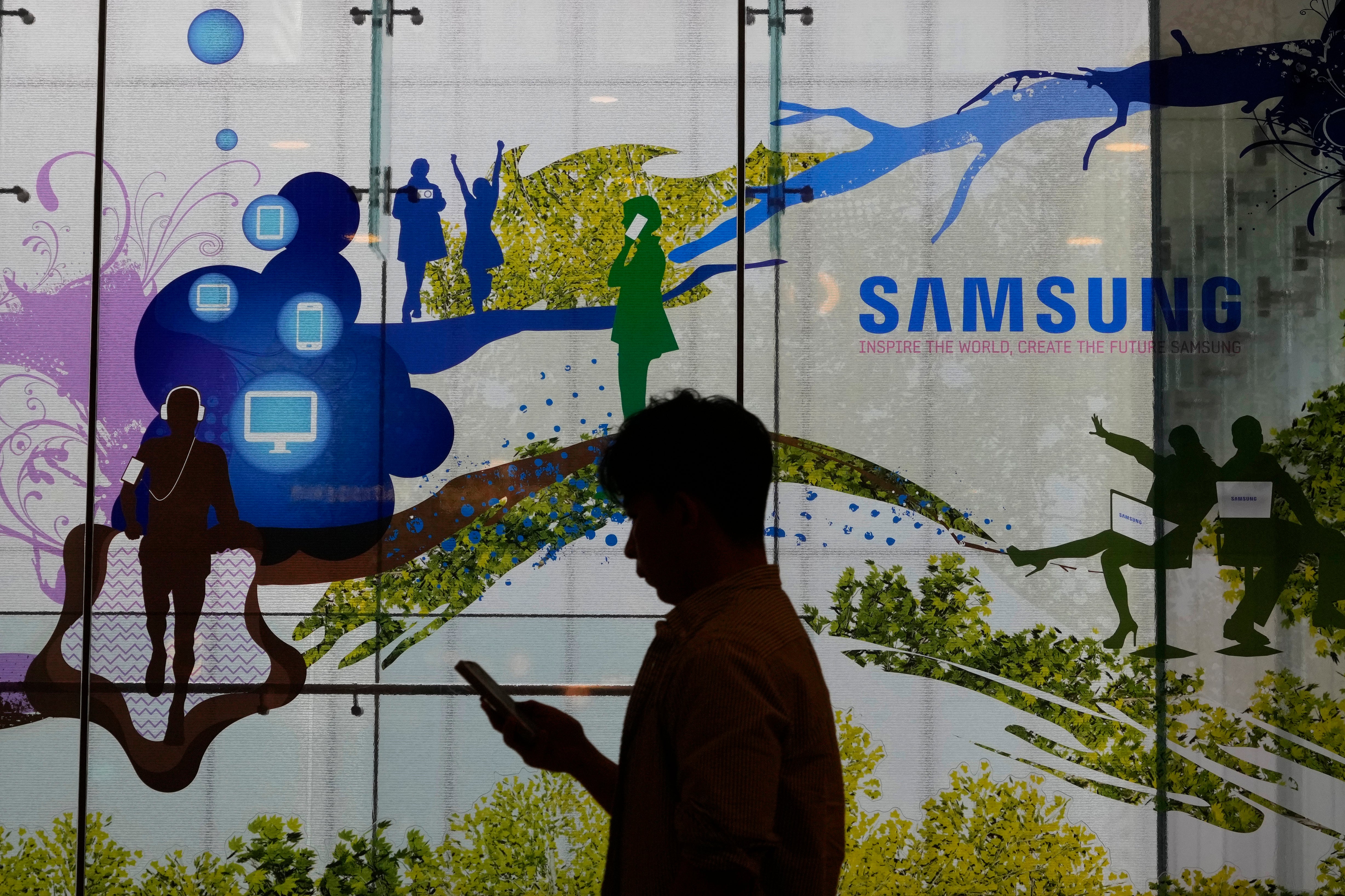 A man passes by Samsung Electronics’ shop in Seoul, South Korea, Wednesday,