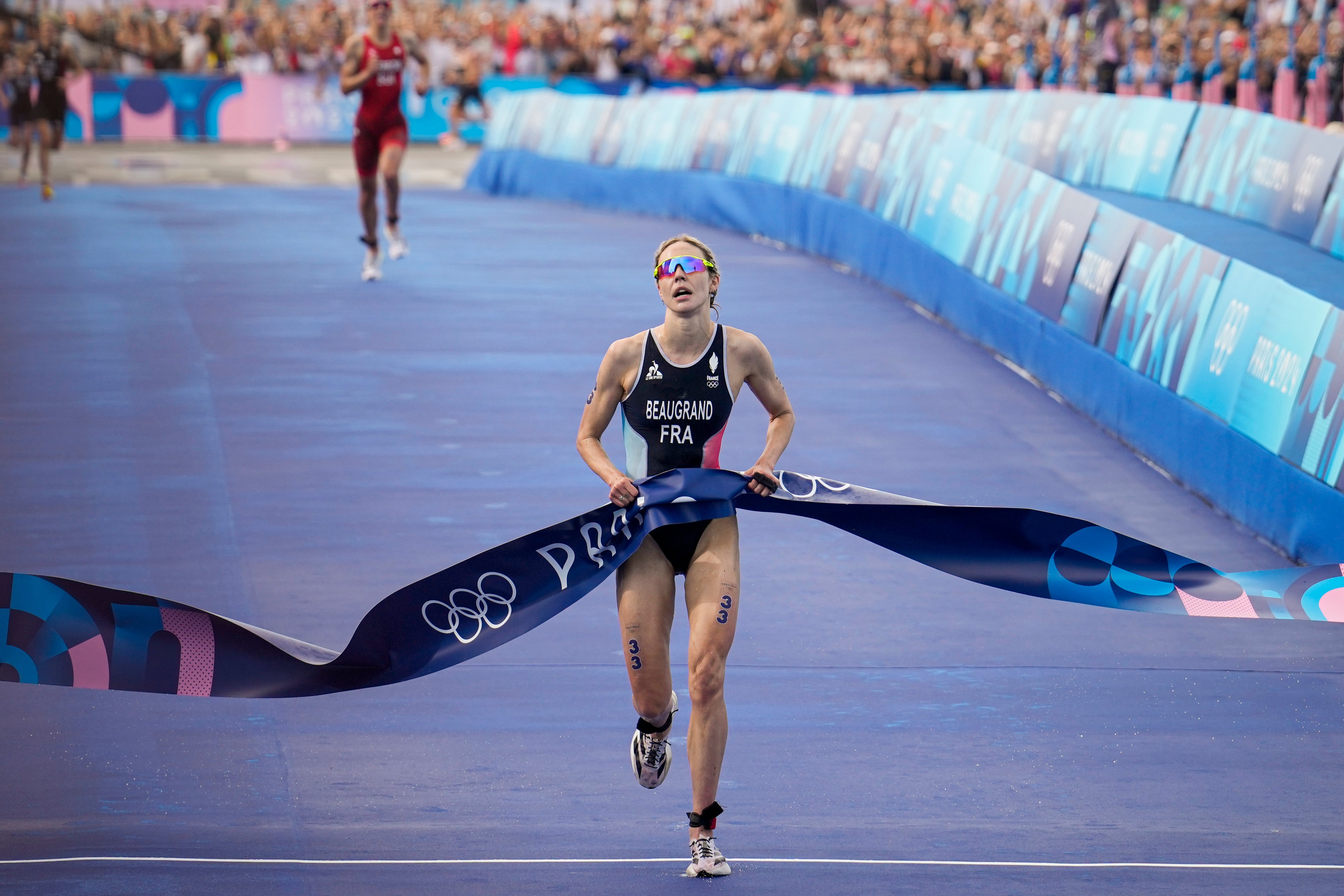 Cassandre Beaugrand bursts away from the field to win gold for the hosts