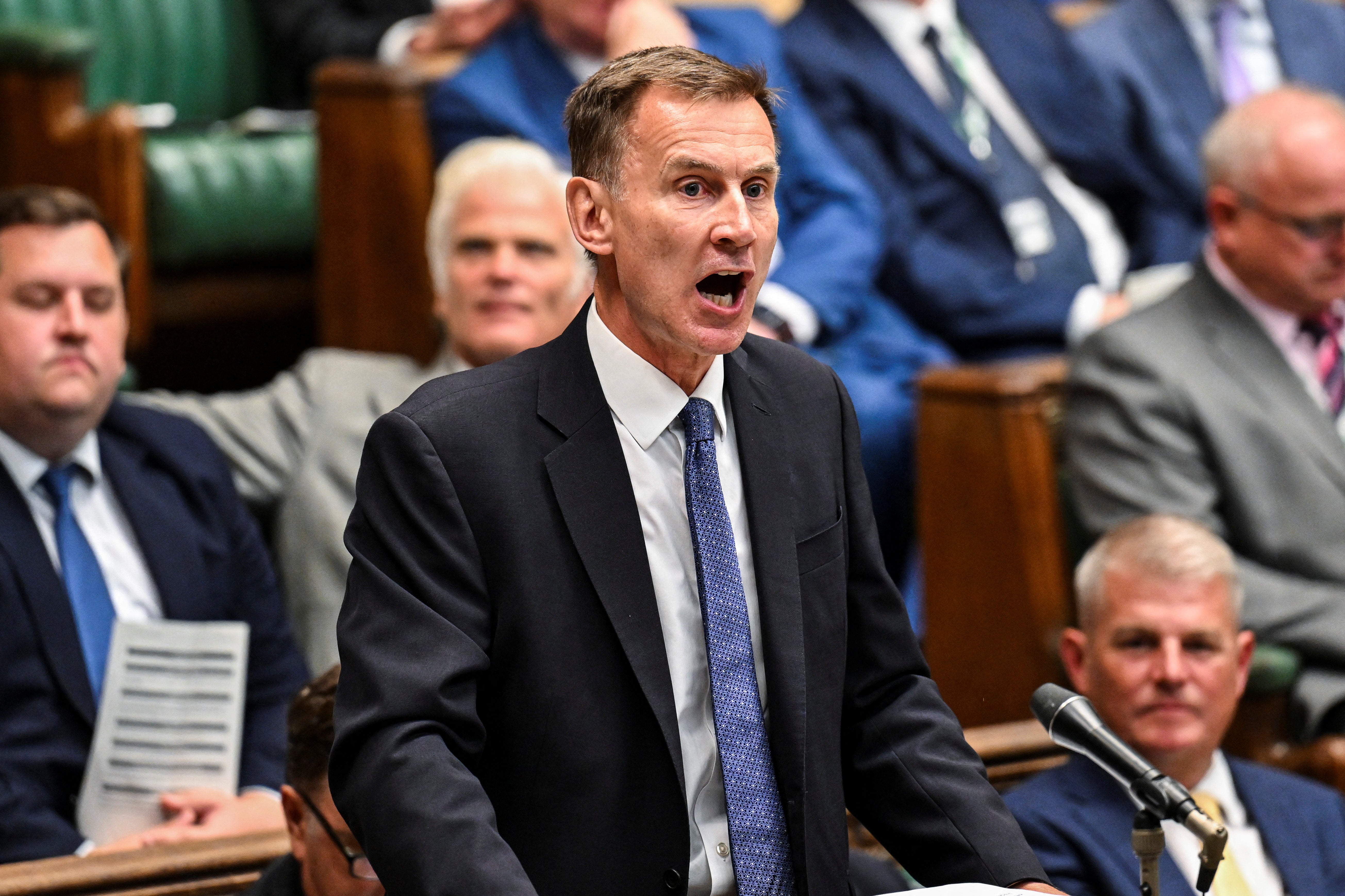 Increasingly annoyed, former chancellor Jeremy Hunt heckled his successor indignantly