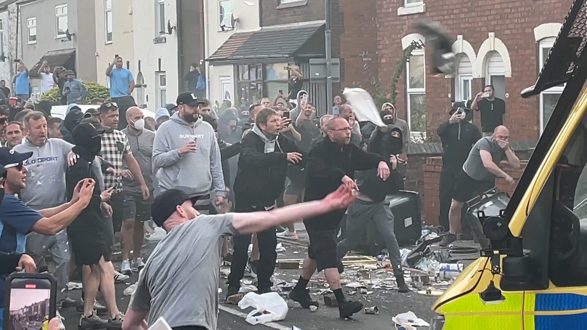 Violence at the Southport protest, which saw a police van set alight (Richard McCarthy/PA)